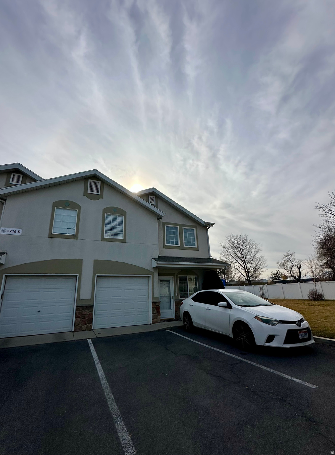 This clean and cute townhouse (a desired end unit next to a large open grass space) is located in a gated community tucked away from Redwood Road. 3 bedrooms and 2 full bathrooms upstairs, including: Huge primary bedroom with 2 walk in closets and a perfect bedroom for a Unicorn lover. Spacious 1 car garage, and private enclosed back patio.