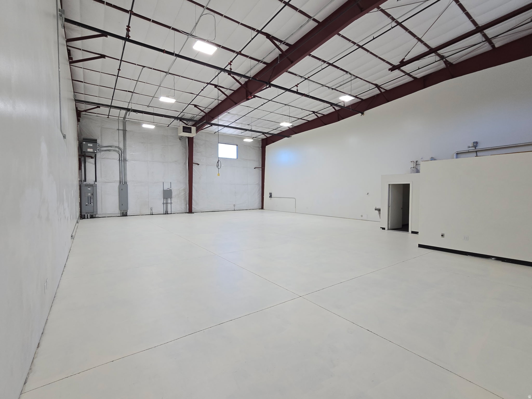 Please contact the owner Randy at 435-881-8777 for all questions and showings. Submit all offers to Listing Agent at redd.alice@yahoo.com. 2990 sq. ft. of warehouse space available for lease. 3 phase power. Includes 400 amp power with 600 amp available. Lessee is responsible for Electricity & Gas Only. Large main floor space with bathroom and drinking fountain. Large 14' x 14' door with 2 other entrances. 4 parking spaces for this unit. Has fire suppression sprinklers. Available immediately.  Square footage figures are provided as a courtesy estimate only and were obtained from county records .  Buyer is advised to obtain an independent measurement.