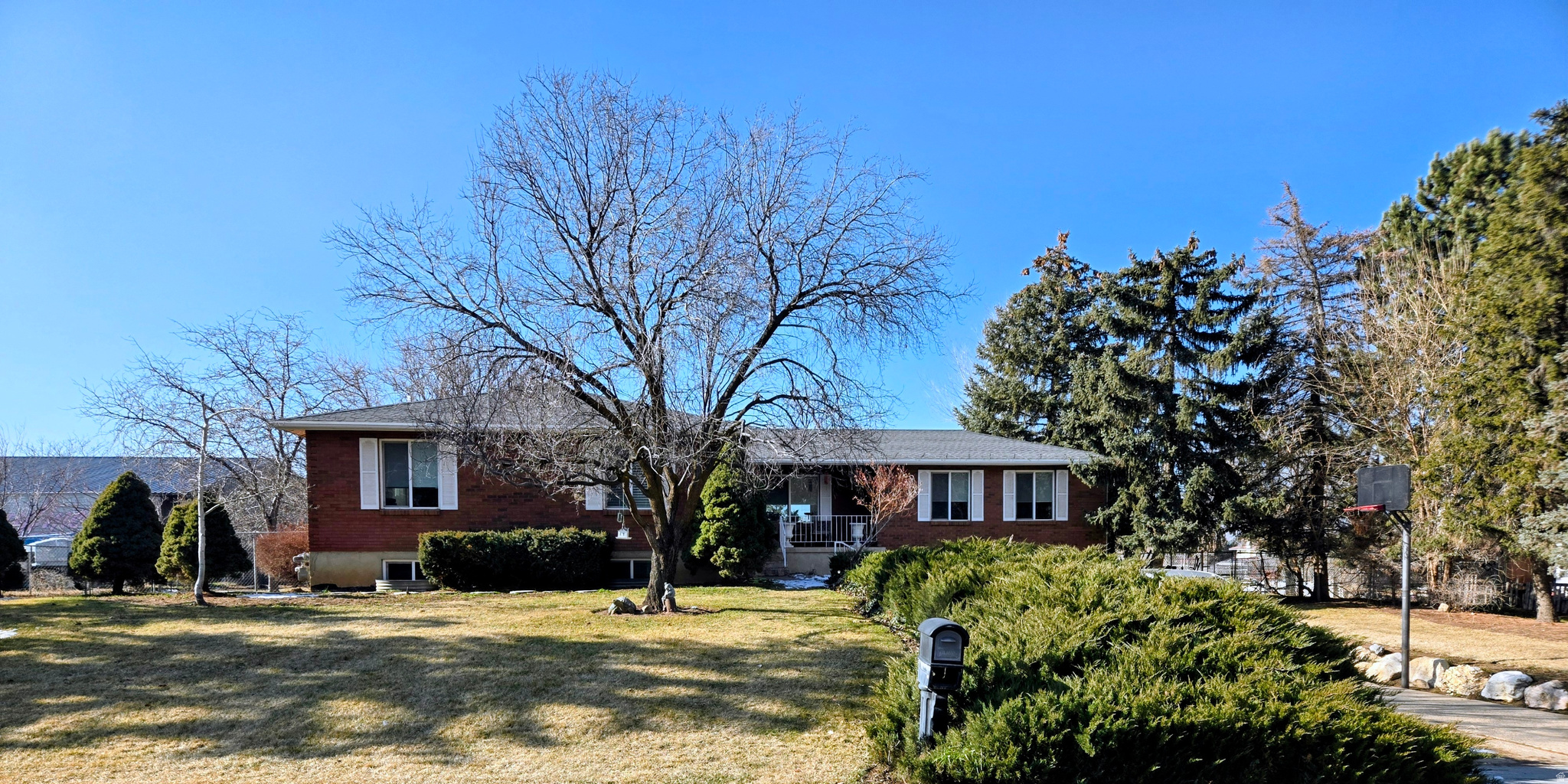 Welcome home to this amazing West Haven property! Almost a full acre, ready for livestock or build your future shop to work your hobbies out of! This home features 6 bedrooms, 2 full bath and 1 3/4 bath in the master bedroom. 2 giant family living rooms on the main level along with an updated kitchen that was finished in 2023. Another living room downstairs along with an office room. So much room and space in this home to raise a family or to entertain! For the folks that appreciate emergencies this home has a built-in generator that will power the whole home if the power goes out. Walk out basement to a beautiful full yard landscaping! This home is awesome and ready for its new owners!