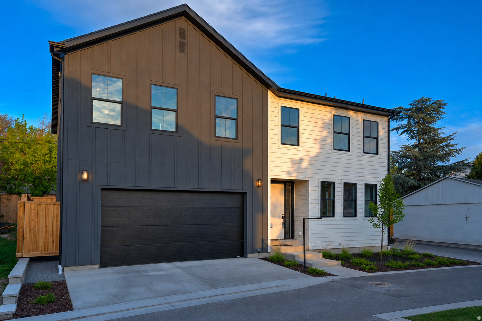 Indulge in this stunning new construction home, perfectly positioned on a quiet cul-de-sac near the University of Utah and the vibrant 9th & 9th neighborhood. This exceptional location is ideal for university faculty, students, or anyone seeking convenient access to downtown amenities, dining, and entertainment.  The oversized three-car garage is EV-ready with capacity for two charging stations, while the fully fenced, low-maintenance yard provides the perfect setting for outdoor living and entertaining.  Inside, you'll find nearly 2,800 square feet of meticulously finished living space featuring five bedrooms and four bathrooms. The open-concept floor plan is filled with natural light from expansive windows that brighten every room. Thoughtful upgrades throughout showcase the quality and craftsmanship expected in a new build, offering modern comfort and style at every turn.  The chef's kitchen is highlighted by a large island and top-of-the-line LG appliances, making it perfect for both everyday living and entertaining. The luxurious primary suite features vaulted ceilings, a spacious walk-in closet, and a spa-inspired bathroom complete with heated floors, a soaking tub, and a large walk-in shower with dual shower heads.  Don't miss this rare opportunity to own an exceptional new home in one of Salt Lake City's most desirable locations. Schedule your private tour today before it's gone.