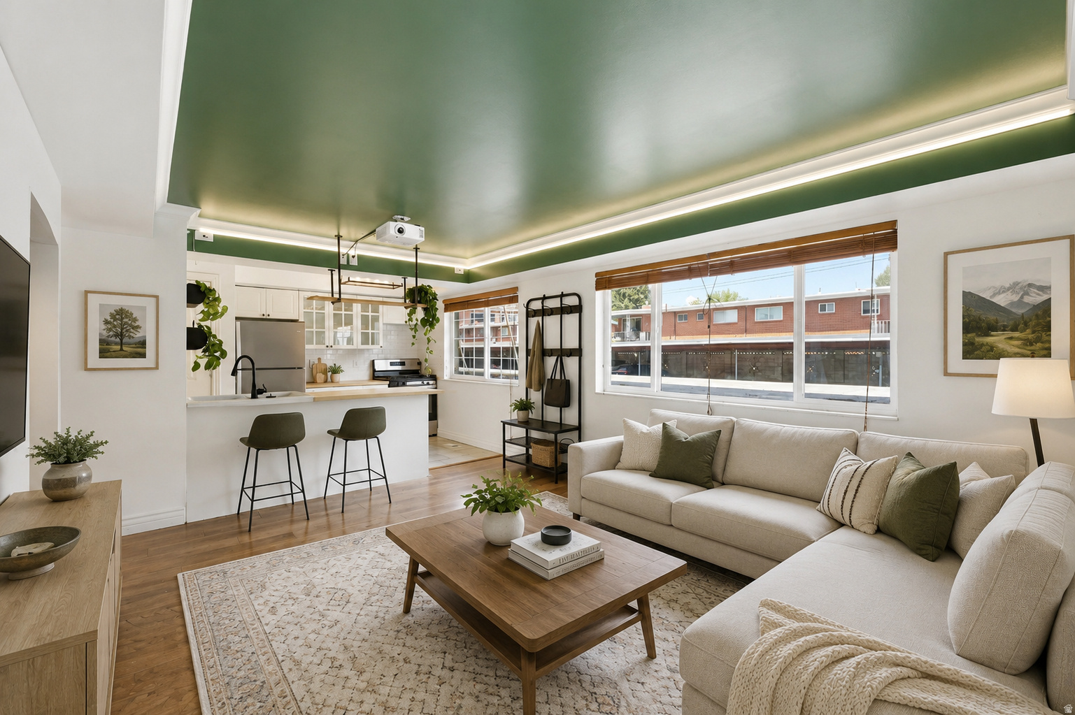Seller offering 1/0 rate buydown with preferred lender 5.43% first-year rate available. Contact agent for details. Welcome to Holladay living at its best! This beautifully updated condo is filled with natural light and fresh, modern finishes throughout. Recent updates include new appliances (all included), fresh paint, new carpet, and updated windows. Making this a truly move-in-ready opportunity. The mountain views to the east frame the livingroom and kitchen windows, bringing in both light and a sense of calm. The living space is thoughtfully upgraded with a "professional home cinema" setup, featuring in-wall surround sound wiring and smart lighting in the living room, creating the perfect environment to relax or entertain. Located just a short walk from Holladay City Center, you'll love having Harmons, local coffee shops, fitness studios, and some of the area's best dining right outside your door. It's the kind of location that makes everyday living feel effortless. Aix La Chapelle is a well-maintained, owner-occupied community featuring two pools, a sauna, a fitness room, covered parking, additional storage, and designated pet areas. The HOA covers most utilities, with only power and internet paid separately. Whether you're looking for a low-maintenance primary residence or a beautifully updated space in one of Holladay's most walkable neighborhoods, this is a rare opportunity to own in a highly desirable community