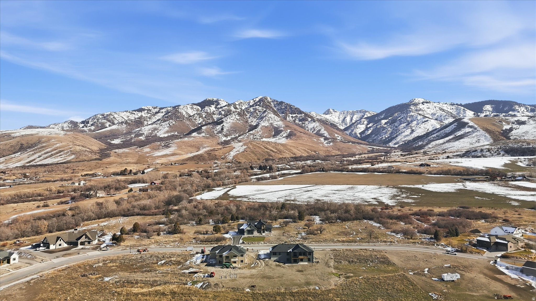 Tucked into the quiet charm of Richmond, this wonderful over half-acre lot gives you that "room to breathe" feeling the moment you arrive. Set in a scenic pocket with  views of both the mountains and the valley, it's the kind of place where sunrise hits the peaks first and evening light settles softly across the landscape. With easy access to the ski resorts, you can be on the slopes without the headache of a long haul-yet you still get the peace, space, and privacy that buyers crave. The lot offers a great blend of usable ground and natural beauty, making it ideal for a custom home with big picture windows, a wraparound deck, and plenty of space for a shop, garden, firepit area, or toys. Imagine stepping outside to crisp mountain air, watching weather roll across the valley, and having that classic Northern Utah vibe-close to adventure, but comfortably removed from the crowds. This is the kind of land that feels like a lifestyle move, not just a purchase.