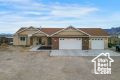 This is a custom-built, 2019 Silva home featuring 4 bedrooms, and 2 bathrooms with a split bedroom floor plan and larger sized bedrooms. You will have plenty of open space in this 2,254 sq/ft one-level home sitting on 4.52 acres. The kitchen includes stainless steel appliances, a double oven, and a pantry. The master bathroom has a large walk-in closet, as well as a soaker tub, a beautiful shower, and his and her sinks. herry trees . Outside you will enjoy the 30x46 shop that previously was converted into a horse bard with 4 stalls with automatic waterers, feeders, and stall mats. All stalls are currently there and will need to be reconstructed. The shop/barn has its own 200amp service, is insulated, has power, a large propane heater, and concrete flooring. The property is fully fenced in the back. The home also includes a small workshop with a full underground bunker and a small shed used as tack room.