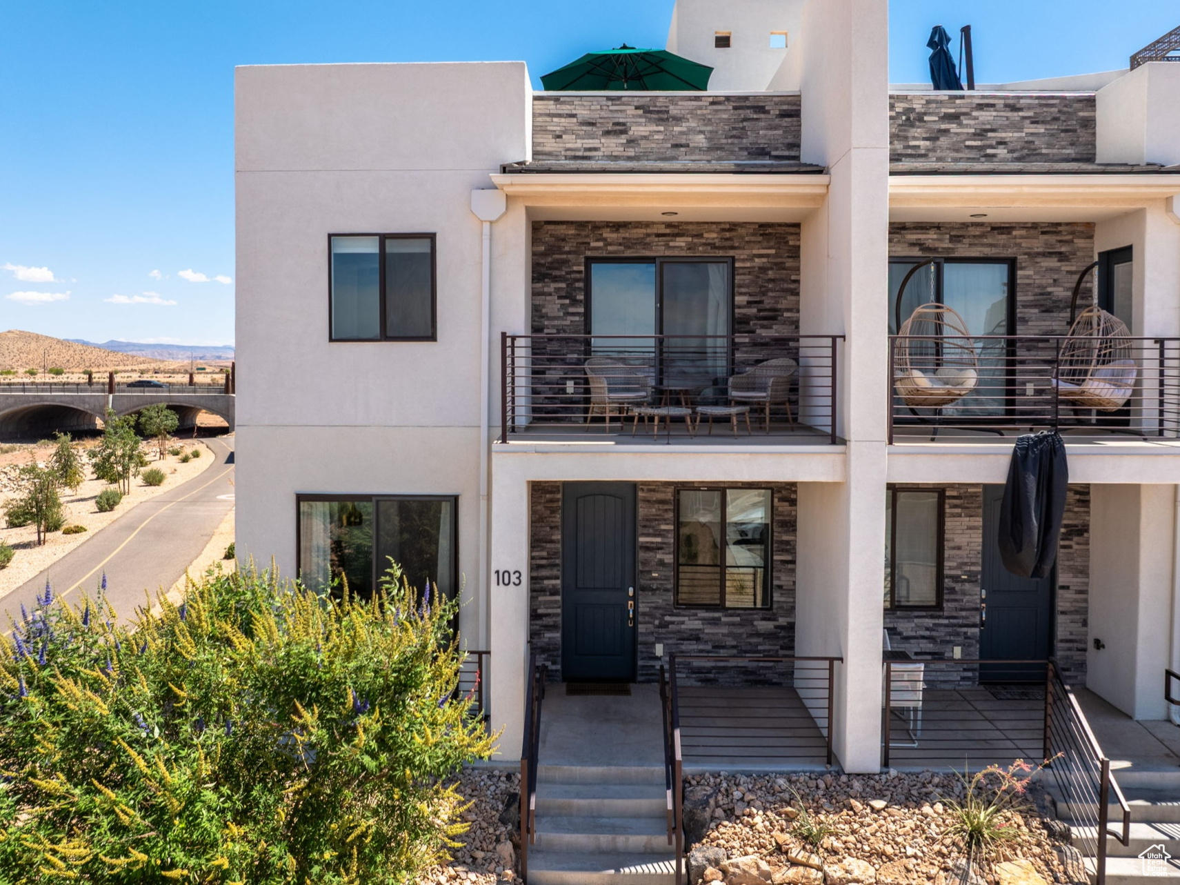 Discover the opportunity to own a 1/8th share of this fully furnished end-unit, three-story condo in the sought-after Desert Color community.  This property offers resort-style living with access to two pools, a 2.5-acre lagoon, and a private spa area exclusively for this section of the neighborhood. Desert Color is rapidly growing, with new shopping, dining, and entertainment options nearby, including a Smith's grocery and a new movie theater and Costco coming soon. This home stands out among others in the building. As an end unit, it features more natural light, a private owner's closet, and every bedroom includes its own ensuite bathroom.  The condo includes three bedrooms, three bathrooms, a half bath, and a loft-style entertainment space with extra sleeping accommodations. The home sleeps 12 comfortably plus consists of a pull-out queen sofa bed. The kitchen comes thoughtfully and fully equipped, including an upgraded induction stove and convection oven. Two private decks create inviting spaces for relaxing or entertaining.  Square footage figures are provided as a courtesy estimate only. Buyer to verify all. The agent is the owner.