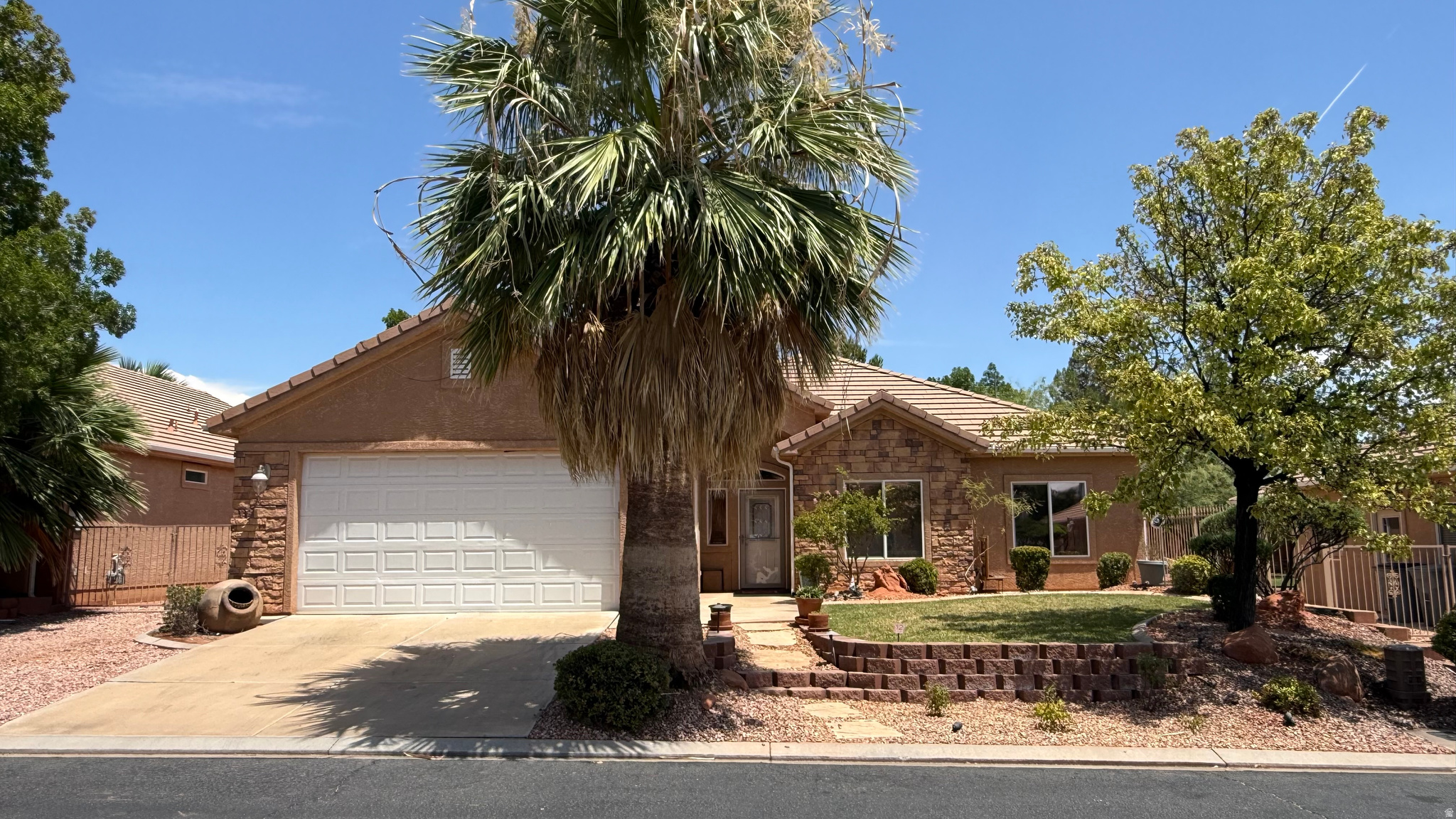 Welcome to this Beautiful rambler home with RV parking with hook ups and a wonderful back yard in the heart of Southern Utah. Clean home with an open floor plan filled with natural light and an oasis-style backyard. Garage has separate HVAC so you can enjoy. This home also has a RO water, new ceiling fans, and automatic blinds through out the home. With a low HOA of $85.00, you can take advantage of the community pool and resort-style living. Come see this one today.
