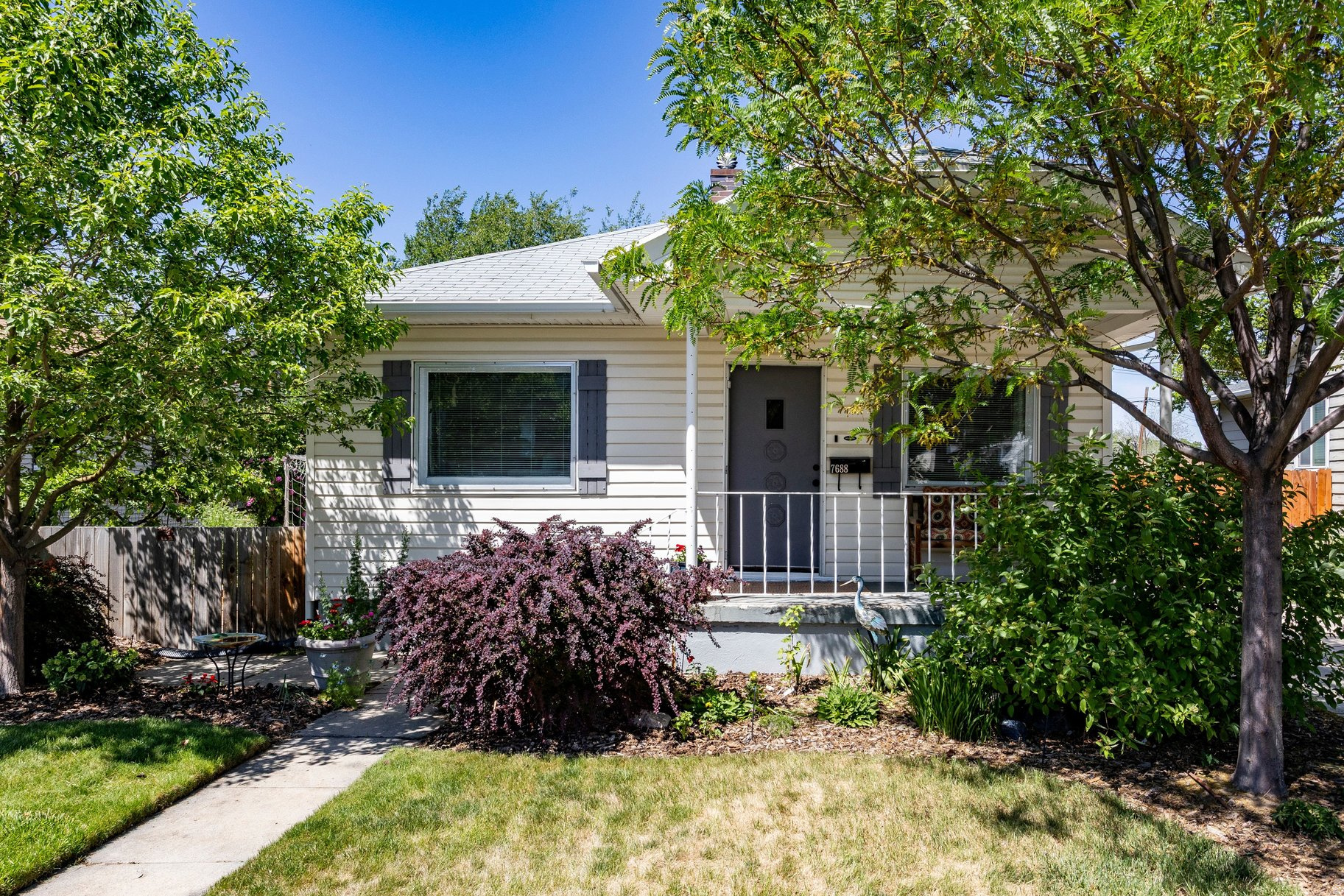 Charming early-1920s bungalow in the heart of Old Midvale featuring darling updated finishes throughout. This cozy home offers 2 bedrooms and 1 bath on the main level, along with inviting living and dining spaces full of character. Downstairs, you'll find a bonus bedroom plus the perfect area for a workshop, hobby space, or additional storage. Situated on a spacious 0.15-acre lot, the property includes a wonderful large shed and still offers plenty of room to build a future garage. A rare blend of vintage charm, functionality, and future potential!