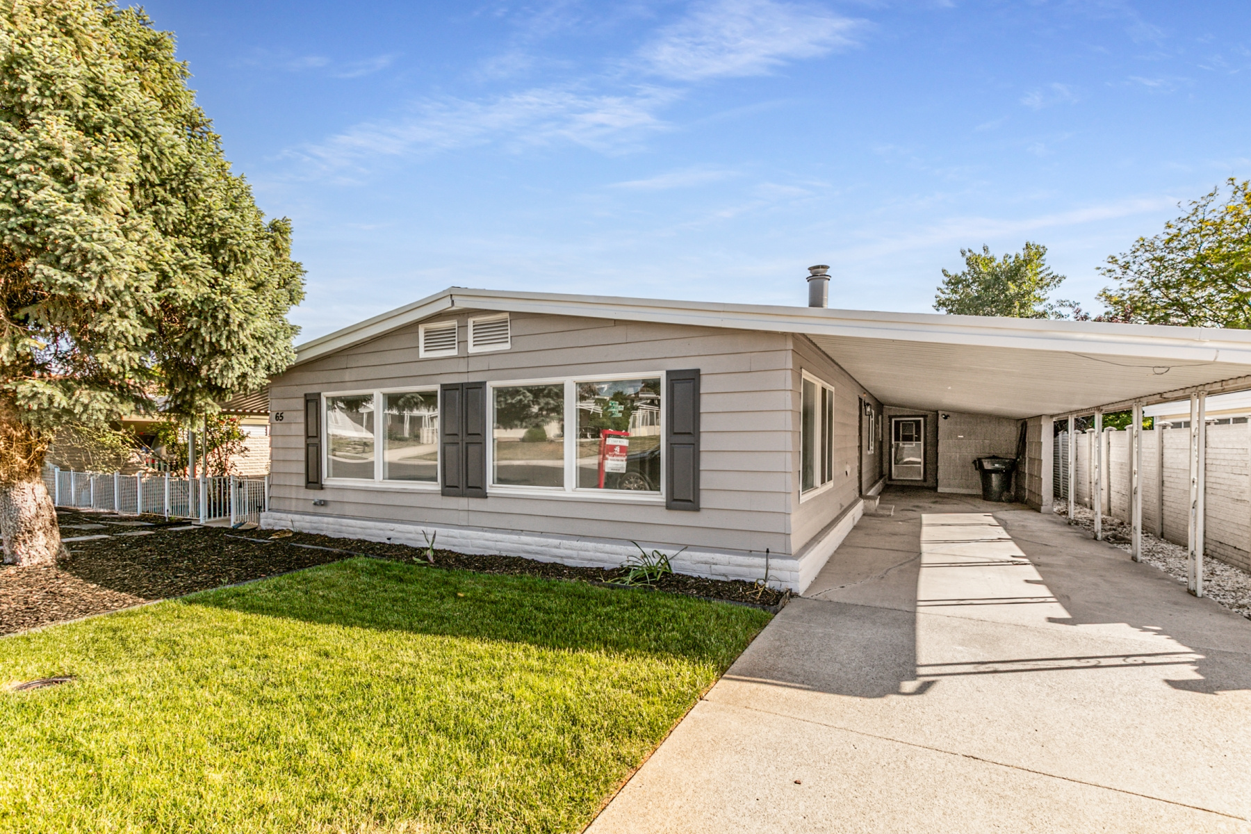 Welcome to one of the most sought after 55+ communities in the state.  Single level living at its finest.  Many upgrades throughout including laminate and tile flooring, quartz countertops, new paint, fixtures, and so much more.  Plenty of opportunities to socialize and activities for every taste.  Pickleball, tennis, swimming, close to world class entertainment, shops, restaurants.