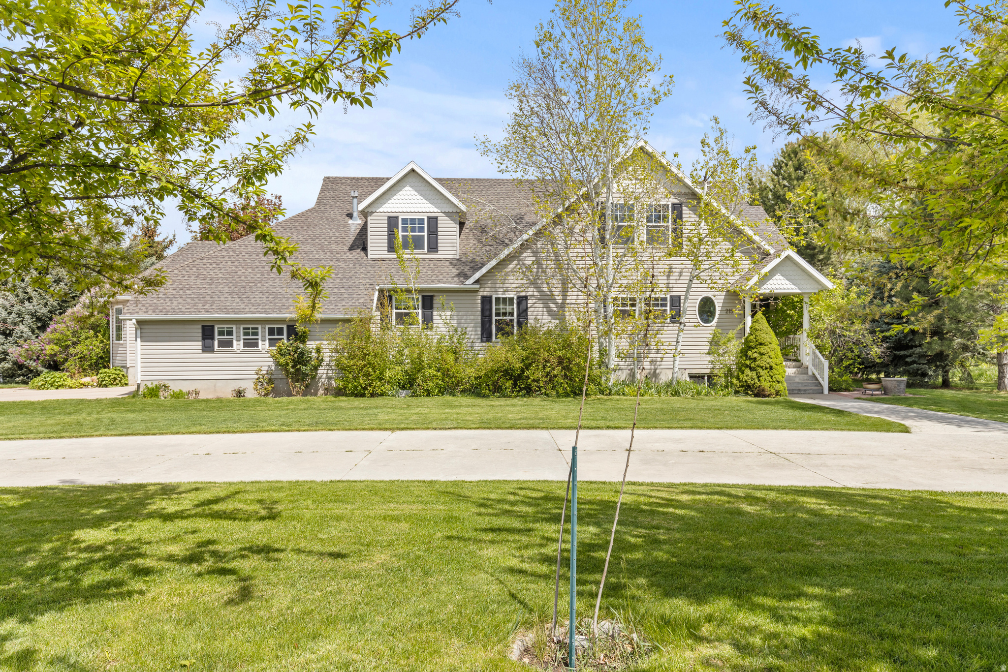 Built in 1999, this well-designed custom home offers over 4,353 sq ft on a generous .59-acre lot with a functional layout and exceptional storage throughout. Featuring 3 bedrooms and 3 bathrooms, the home includes a bright main-level primary suite with bay windows, plus a fully finished basement with excellent potential for a future rental unit. Basement has separate entrance for convenient access.  Two rooms in the basement are not included in the bedroom count, but both rooms do have closets. Huge circle driveway for guest parking and easy access to the home.  The kitchen is equipped with warm cherry cabinetry and flows into inviting living spaces ideal for everyday living and entertaining. Buyers will appreciate the abundance of built-ins and storage options rarely found at this price point. Home also is wired for full home sound system.  Step outside to a large north-facing deck-perfect for relaxing or hosting-overlooking a spacious yard. The property also is situated in a convenient location with easy access to nearby amenities. Additional highlights include two water heaters, a water softener, central vacuum system, jetted tub, and thoughtful custom touches throughout. Basement exterior walls and ceiling are fully insulated for sound proofing. Home comes with 1 water share of irrigation and is set up with pump and full sprinkler system.  With strong curb appeal, solid construction, and room to add your own updates, this home presents a fantastic opportunity to build equity and make it your own. Floor plan was found in a Life Magazine Dream house  and was the winner in 1994. Designed by Architect Robert A. M. Sterns.