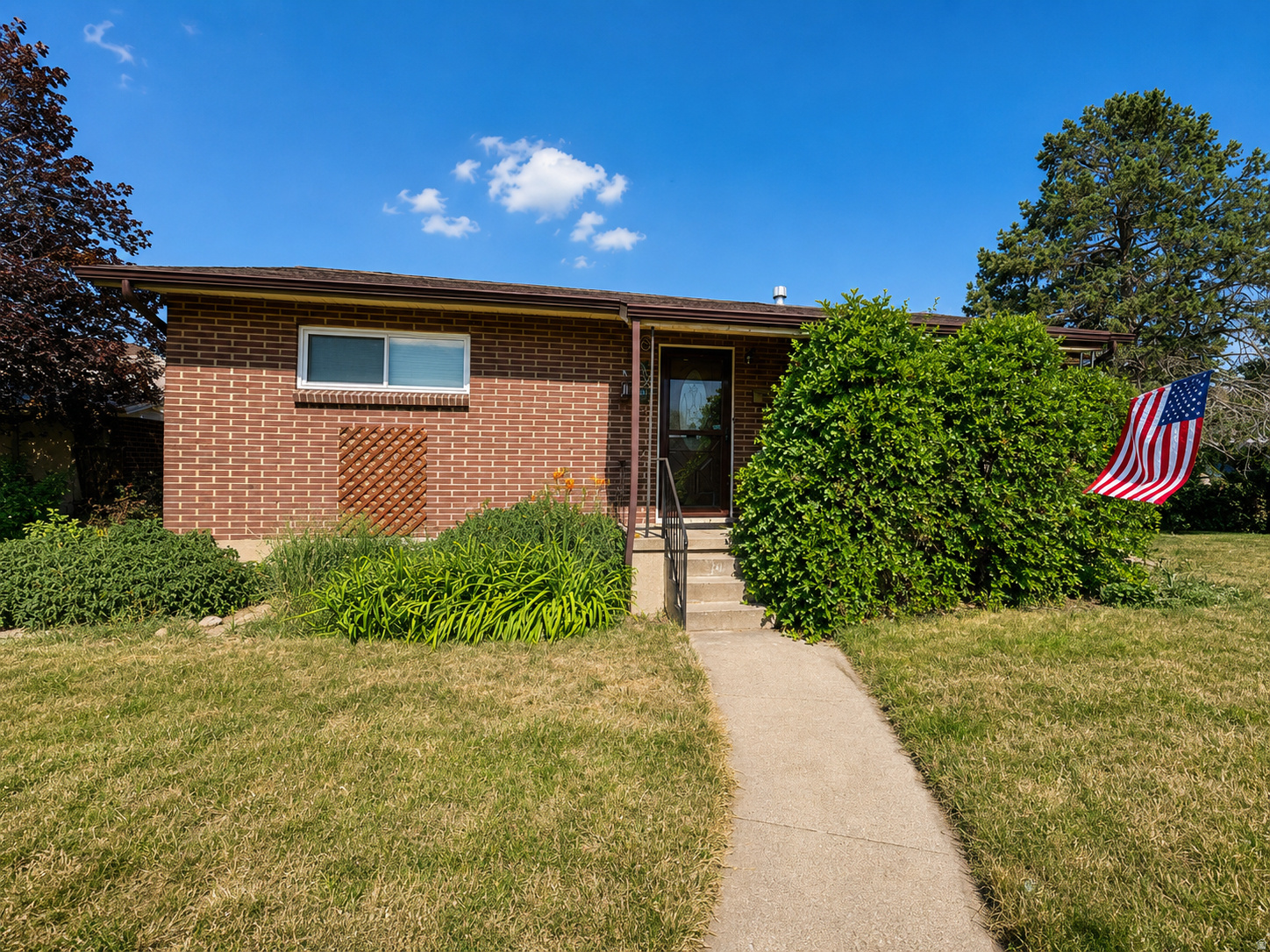 ***Go with Seller's preferred lender and receive up to $3,000 towards Buyer's closing costs. Ask agent for more details***Well-maintained all-brick rambler on a huge corner lot with oversized 25' x 24' detached garage, abundant parking, and full landscaping. Features updated kitchen with new LG range, microwave, Frigidaire refrigerator, new flooring, updated vinyl windows, PEX plumbing, updated electrical panels, central air, Ring cameras, fiber internet, and low utility costs. Main level offers 2 bedrooms and 1 bath. Basement includes office/flex room, laundry, cold storage, and space for future family room. Convenient Midvale location with quick access to I-15, shopping, and amenities. Solar panels to be negotiated. ***Go with Seller's preferred lender and receive up to $3,000 towards Buyer's closing costs. Ask agent for more details***