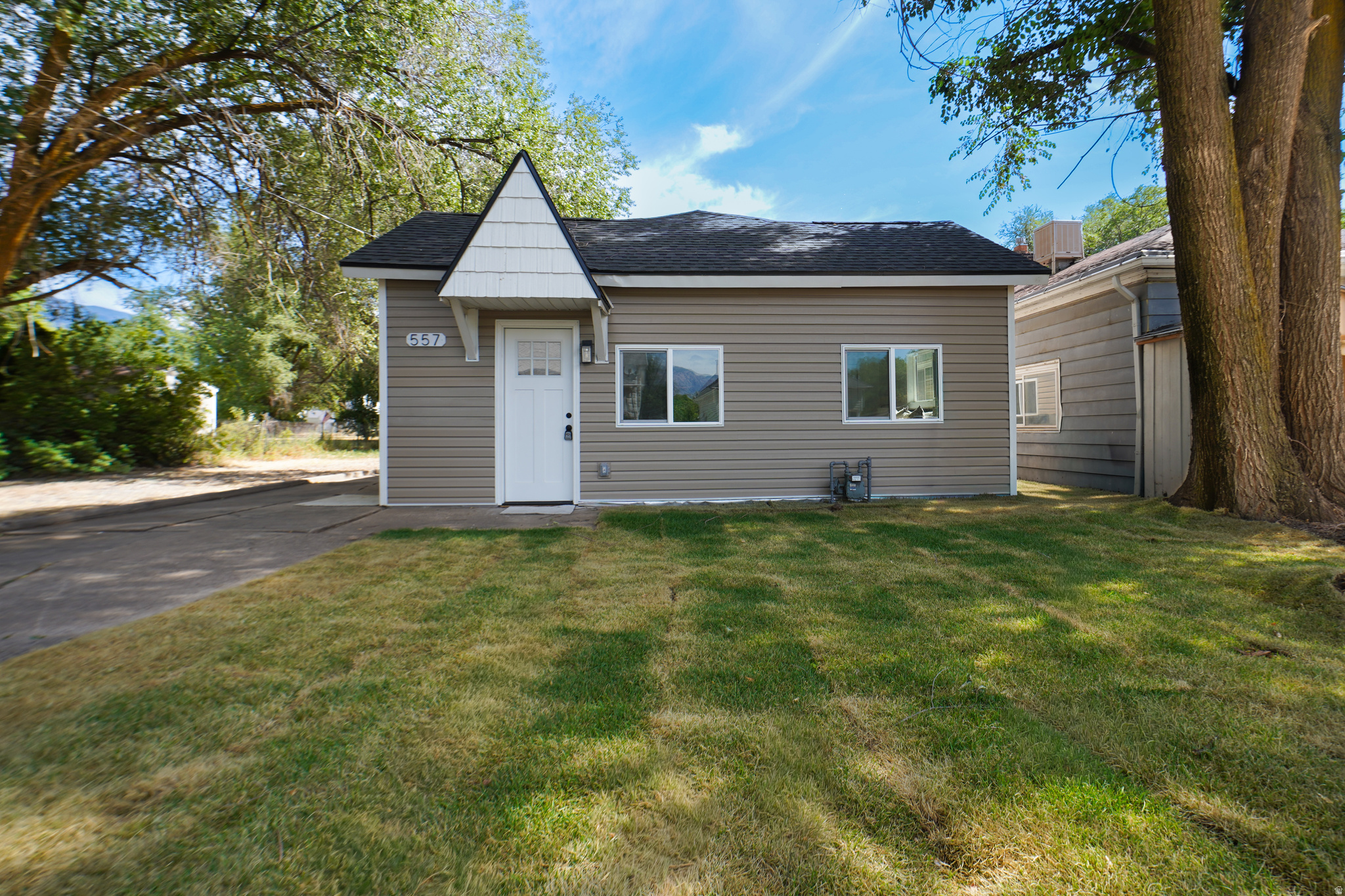 Move-In Ready Single-Level Home in Ogden! This updated 3-bed, 1-bath home features fresh paint, new flooring, and new windows throughout. The kitchen boasts new cabinets and quartz countertops with stainless steel appliances - updated bathroom with modern finishes.  All the big-ticket items are done: brand-new 30-year roof, furnace, AC, windows, and water heater. The backyard offers privacy with large shade trees and space to enjoy, while the single-level layout makes for easy living.  Updated top to bottom - this one won't last long. Schedule your showing today!