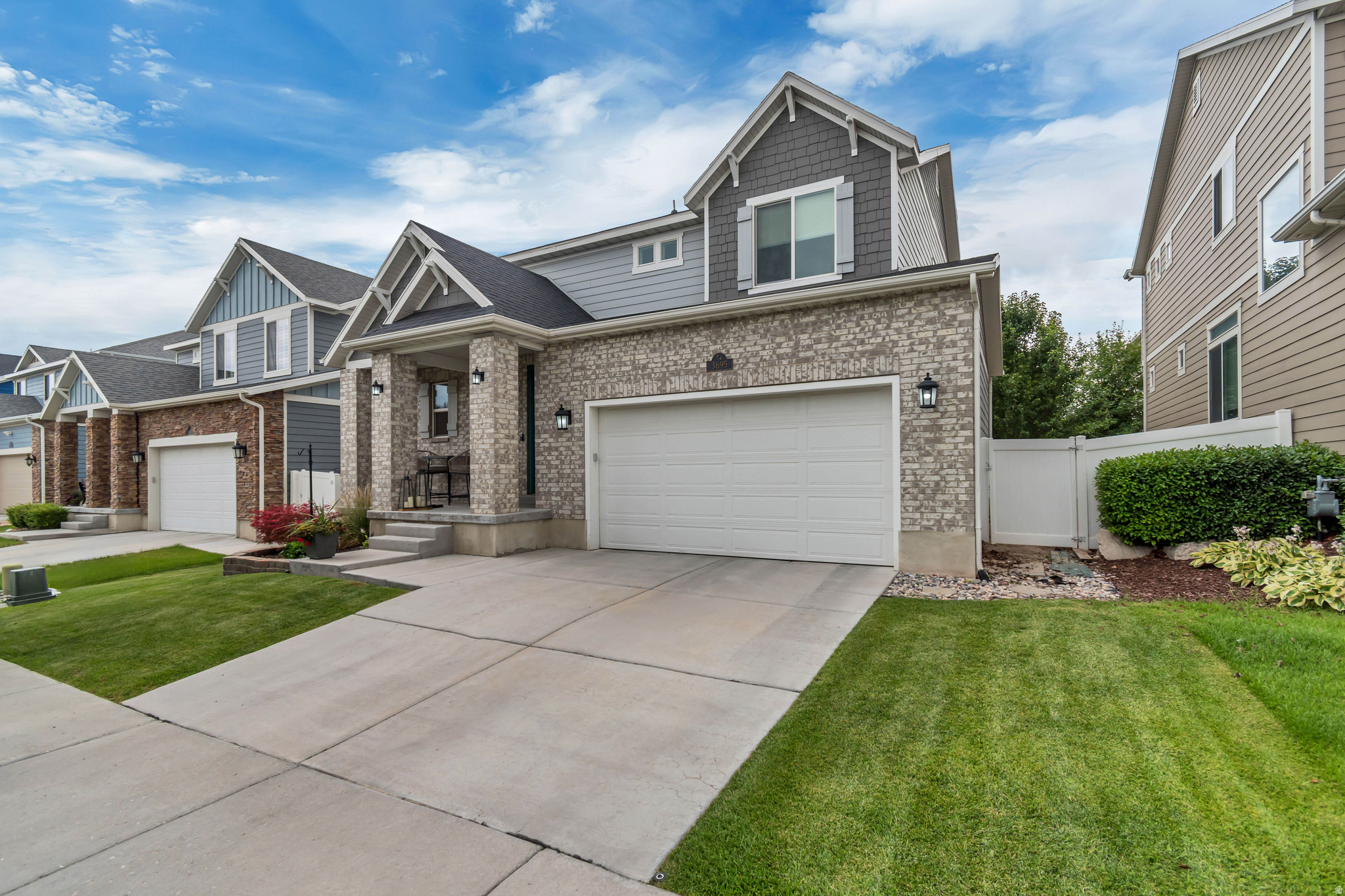 Welcome home to this stunning, turn-key single-family residence situated in a highly desirable and vibrant South Jordan neighborhood. Offering the perfect blend of modern sophistication and functional comfort, this spacious 4 bedroom, 3.5 bathroom home boasts 3,252 square feet of beautifully curated living space. Step inside to an inviting, sun-drenched open layout featuring premium flooring and contemporary finishes throughout. The heart of the home is the chef-inspired kitchen, fully equipped with sparkling granite countertops, timeless stainless-steel appliances, ample cabinetry, and an expansive center island that is absolutely ideal for meal prep, casual morning breakfasts, or entertaining guests.