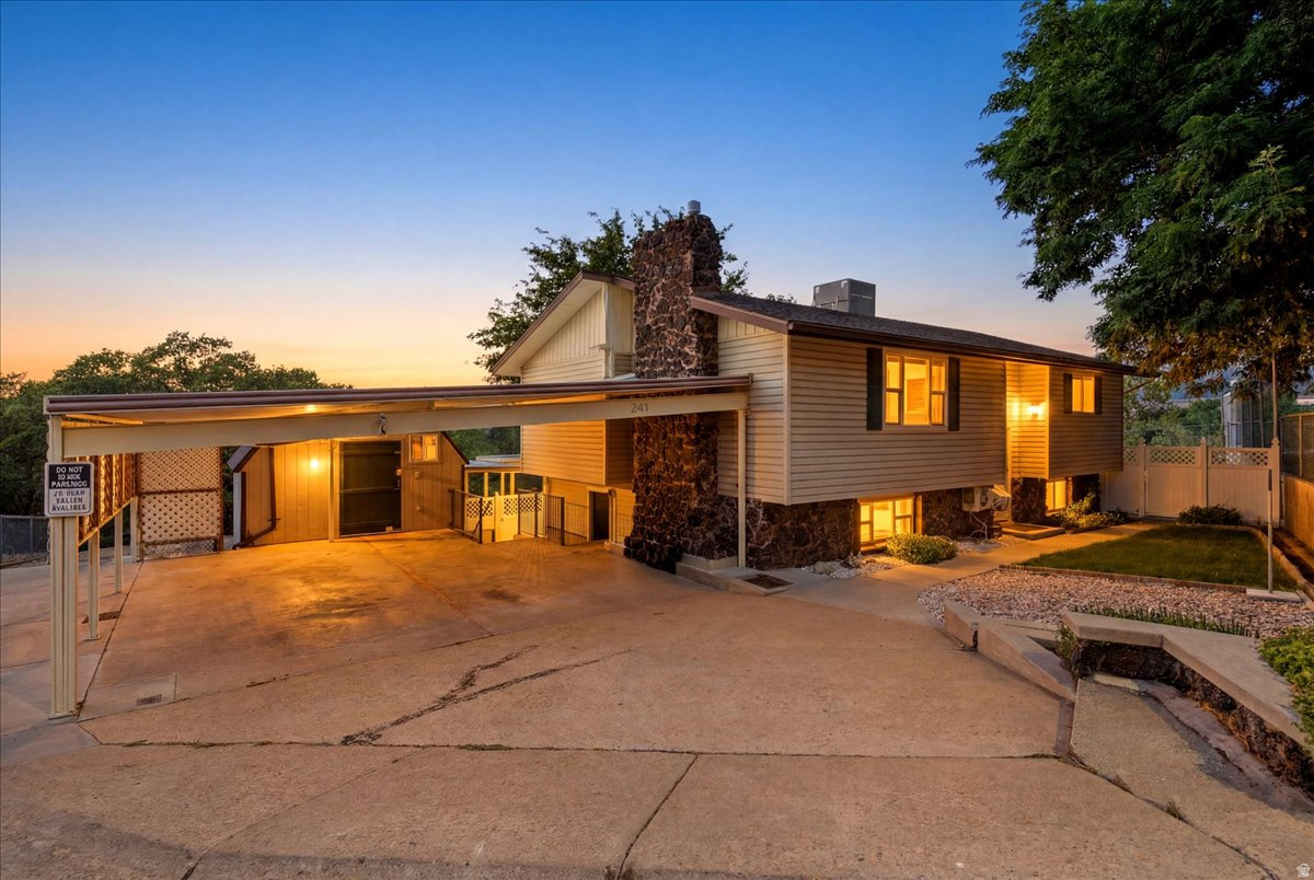 Great home located on dead end street with great mountain views.  Walking distance to hiking and biking trails.  This home sits on large .45-acre lot.  Home has two separate entrances from basement.  There is a room with entrance to basement kitchen area with sink.  Possibilities of adding more cabinets, stove and fridge to make a complete kitchen for a mother-in-law apartment.  There is a workshop with 110 and 220 power.  Home has central vacuum.  Furnace and A/C were updated a few years ago along with new water heater installed 2026. Fridge, washer and dryer will stay.  Great laundry room with cabinets, sink and built in ironing board.  Kitchen has been updated with cabinets, countertops, appliances and has a pantry.  Large, fenced garden area.