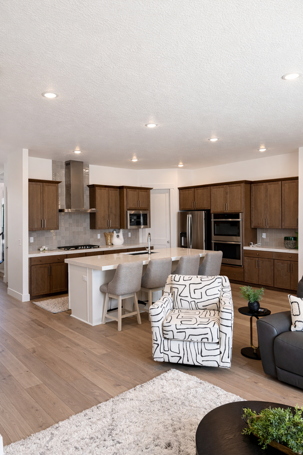 This beautiful 4 bed 5 bath custom home sits on a spacious .75-acre lot w/ options for out buildings, animals, including horses and more.  There is so much to offer-starting w/ a grand two-story entry, 10' main floor ceilings, and tons of natural light throughout. The kitchen is a standout w/ quartz countertops, large island, double wall ovens (w/ convection), vented hood, and a spacious pantry. The living area features a gas fireplace w/ a custom wood slat accent wall, and the home includes two primary suites, giving you great flexibility. In the basement you'll find 9' ceilings w/ floor trusses, an exterior entrance for a possible ADU and room to grow. There're also 2 HVAC systems for comfort year-round and a 3rd car garage. Located w/ easy access to I-80, this property feels quiet and peaceful w/ amazing views-but you're still just minutes from shopping and downtown.  TV's and furniture negotiable.