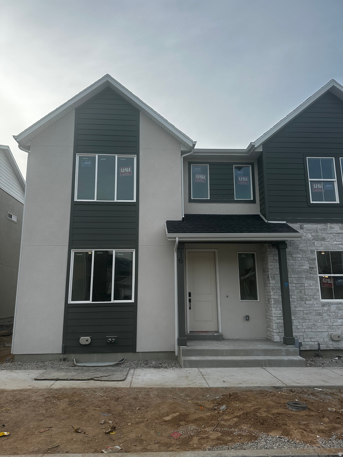 QUICK MOVE-IN! Estimated completion is Mid-February! Seller is offering $10K lender incentive!!  Luxury townhome in gorgeous Mapleton. Come experience the tranquility of this amazing city. Removed from the busyness of Utah County, this community provides a quiet, yet convenient location. Tucked away in a developed community, yet provides quick and easy access to shopping, restaurants, golf, and other outdoor activities. You'll love it here! Minutes to Spanish Fork and Springville. Our popular Grace floorplan features 3 bedrooms and 2.5 bathrooms, along with an open concept main living area with a large great room and kitchen with a deep island, a perfect area for cooking and entertaining. The upper floor features the spacious primary suite, with walk-in closet and extended bathroom. The upper floor also has two additional bedrooms and an amazing loft to use as a study or game area. The parking is easy with a wide two-car garage. Unfinished basement with a pre plumbed bathroom and space for a family or additional bedroom along with a storage room/closet! (Interior photos are not of the actual listed unit. They are from our model home to show staging. Each home is finished with the same interior features).