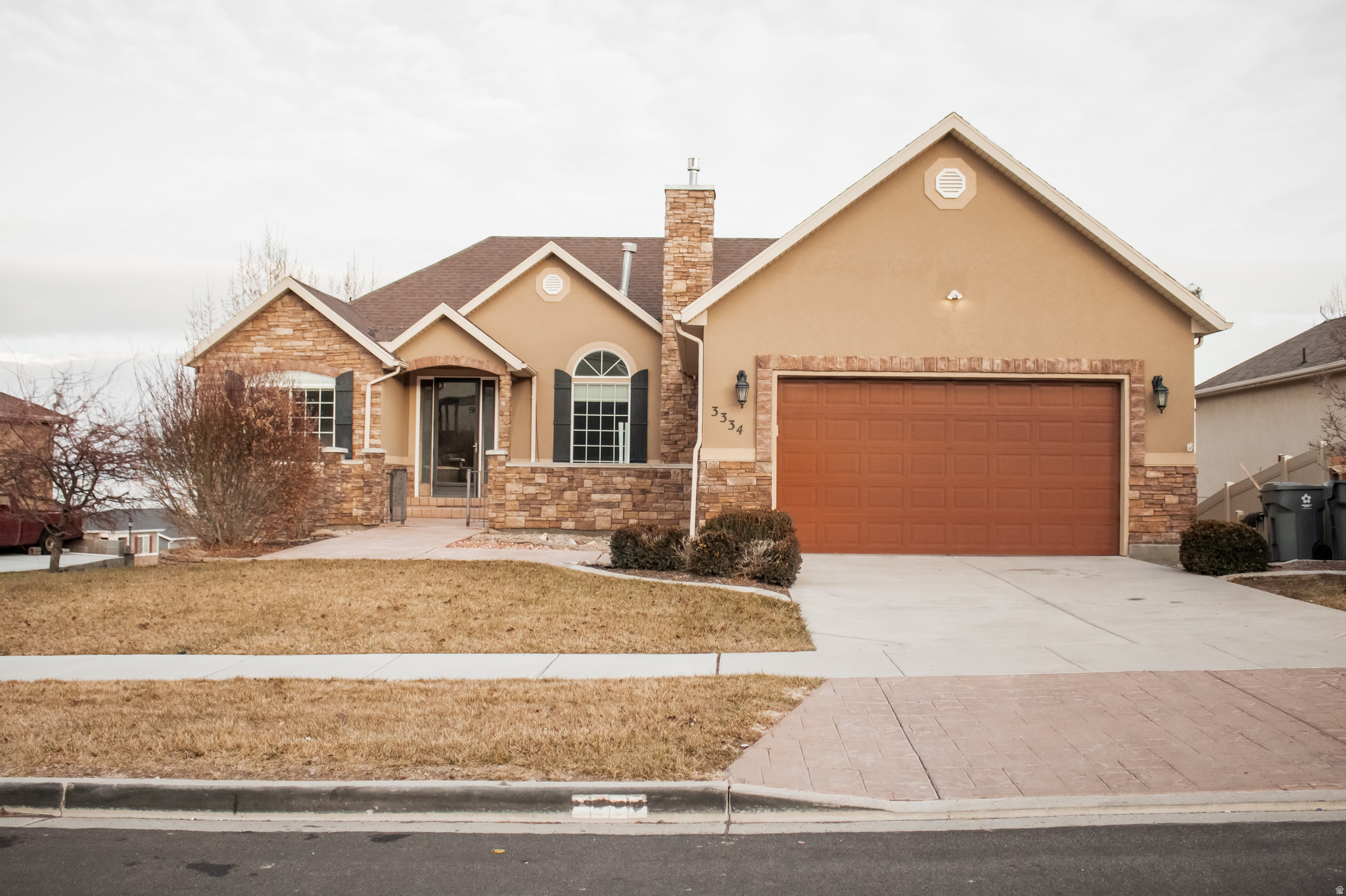 This 6-bedroom home in Saratoga Springs offers a functional layout and unrivaled views of Utah Lake and the Wasatch Mountains. The exterior features stone upgrades that provide great curb appeal. On the main floor, you will find 3 bedrooms and a formal dining room. The kitchen area opens up to a large upper patio that is ideal for grilling and outdoor gatherings while taking in the lake views.  The basement is fully finished with an additional 3 bedrooms, a kitchen, and its own separate entrance.  Current basement tenants are paying $1,900 and are willing to stay  The home is located within the Alpine School District boundaries for Riverview Elementary and Vista Heights Middle School. This is a practical choice for a buyer looking for a spacious home with the added benefit of potential rental income in a growing area.