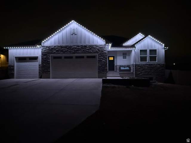 Stunning Home with Mountain & Lake Views, RV Pad, Sports Court & 3060 Shop!  This incredible property sits on a huge lot and is perfect for entertaining. Enjoy breathtaking mountain views from nearly every window. The spacious three-car garage, massive RV pad for toys, 5th wheel, or boat, and a sports court make outdoor fun effortless.  A giant 3060 ft shop with mezzanine offers plenty of storage or workspace. The master suite features a large bath with a separate shower, and both the front and back yards are fully landscaped.  Located in a one-of-a-kind neighborhood with generous spacing between homes, the property provides rare peace and privacy. From the deck, you can enjoy views of the mountains and valley while staying completely private in your own yard.  The fully finished basement includes a full kitchen, two full baths, and a separate entrance-perfect for guests or a rental opportunity.  Square footage figures are provided as a courtesy estimate only.  Buyer is advised to obtain an independent measurement.