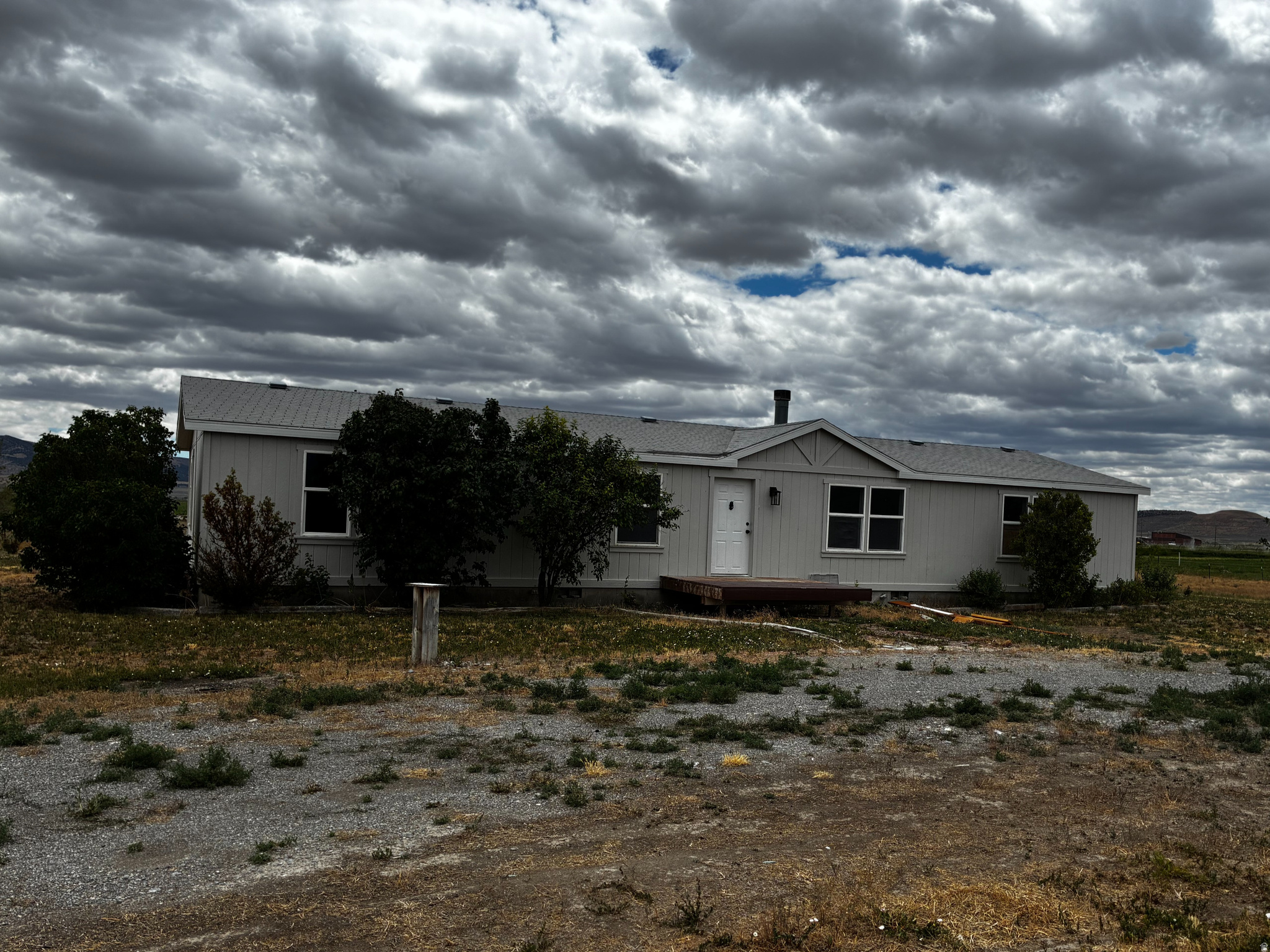 Enjoy the peace and quiet in this newly remodeled home in Stone, Idaho!  This manufactured house has been competely updated; from lvp flooring, new carpet to custom cabinets.  Home has a great, open floor plan; with large living room and bedrooms with nice walk-in closets.  Tile will be completed within the week.  Property boasts 2.25 acres, perfect for any animals and ample space for all your projects.  Square footage figures are provided as a courtesy estimate only and were obtained from _____Oneida County_________ .  Buyer is advised to obtain an independent measurement.