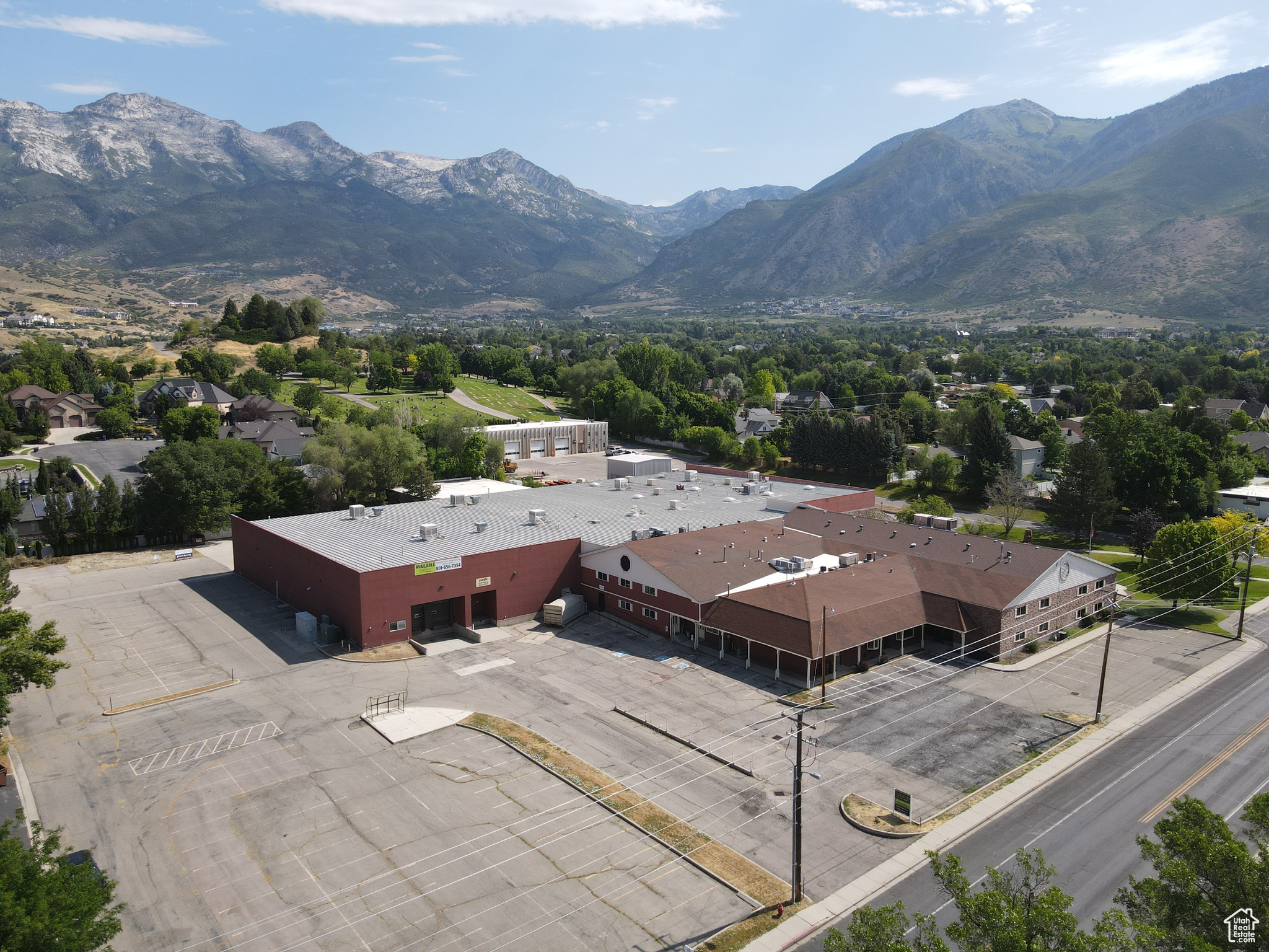 90,581 SF  Two (2) 9'x10' dock doors with seals and levelers  One (1) 5'x8' box height loading door  One (1) 14'x18' grade level door  Clear height: 20'  Over 17 different production rooms  Multiple break rooms and bullpens with ample bathrooms  Wet and dry suppression system  Ample heavy power  Exhaust vents  Floor drains  Power drops  Trash compactor  Water recyclers  Water cooling system  Multiple water lines running length of the warehouse  Gas forced heaters  Swamp coolers  Compressed airlines  Water hookups on both levels  Three compartment sink  Eye washing stations  Powder room  Skylights throughout  Masonry construction  Year built: 1990  Lot size: 4.12 acres  Ample parking  Zoning: Business Commercial  Location: convenient infill location in the heart of Alpine  Access: located off of Timpanogos Highway