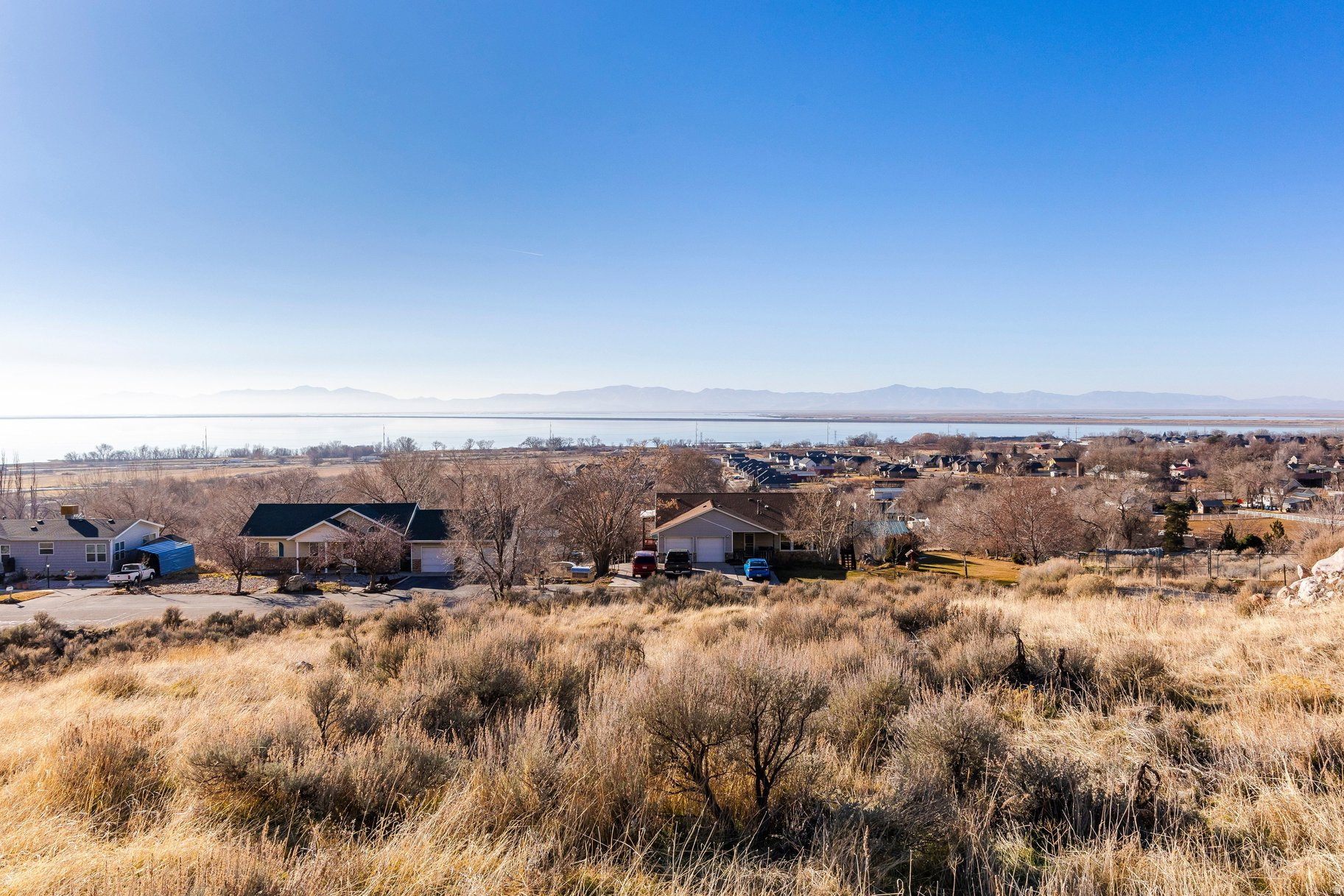 Build your dream home on this stunning lot with mountain views and  views of Willard Bay.  The spacious  half acre size will allow many optional floor plans as well as an ADU on the same lot.