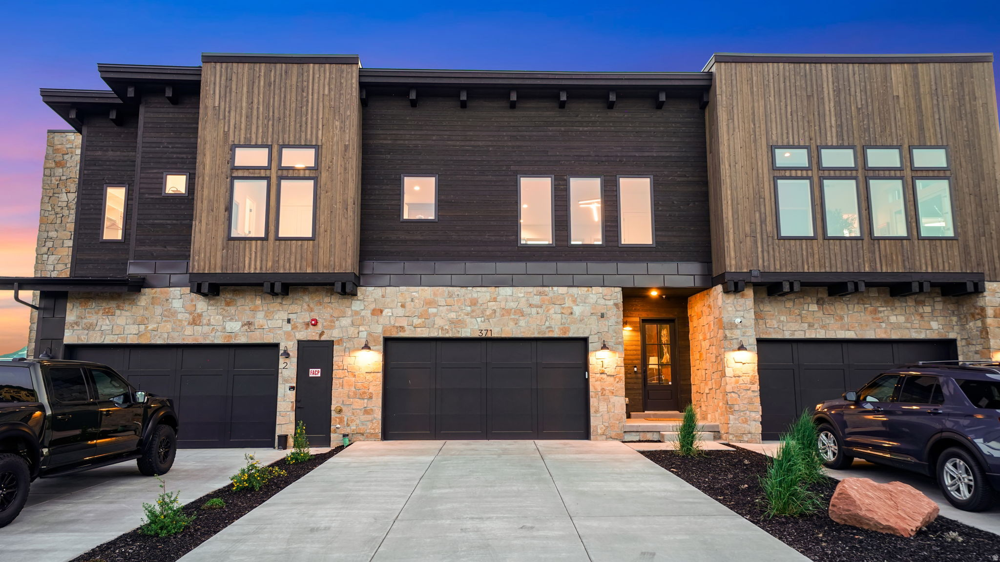 Welcome to effortless Wasatch Back living, where thoughtful design meets world-class amenities in one of Utah's most coveted private communities. Built in 2025 by Hillwood Homes, this 3-bed, 3-bath, 2,281 sq ft townhome at Red Ledges has been elevated well beyond its original finishes, with over $75K in owner upgrades that make it truly move-in ready. Step inside to soaring ceilings, abundant natural light, and a warm, designer aesthetic defined by bespoke details: custom noise-dampening wood panel walls, curated wallpaper accents, gallery lighting over artwork, and concealed wiring throughout. The kitchen features Thermador appliances and under-counter lighting, while the primary bath has been upgraded with heated elements for those cold mountain mornings. Every TV in a bedroom is a new Samsung Frame, with wires hidden naturally. The garage has been transformed into a true mountain basecamp: heated, finished with elevated design storage, a dedicated boot dryer, clothing rack, and its own TV, equal parts functional and fun. Fully furnished with designer pieces valued at $25K+, along with a premium Traeger grill and fire pit. Just unpack and enjoy. Red Ledges isn't just a place to live, it's a community built around how mountain people want to spend their time. Ski Deer Valley or Park City via the community's private shuttle, steps from your front door. Play golf on the Jack Nicklaus Signature 12-hole Golf Park, with the option to add a Golf Park membership granting access to the course and all the privileges that come with it. Rally at the brand new indoor tennis facility, complete with its own bar. Swim, train, and relax at the full fitness center, pools, kids' splash pad, and Village Center restaurant, all walkable from this unit. Furniture, all Samsung Frame TVs, Traeger, and fire pit included. Select personal art, sculptures, silverware, glassware, and the piano are excluded.