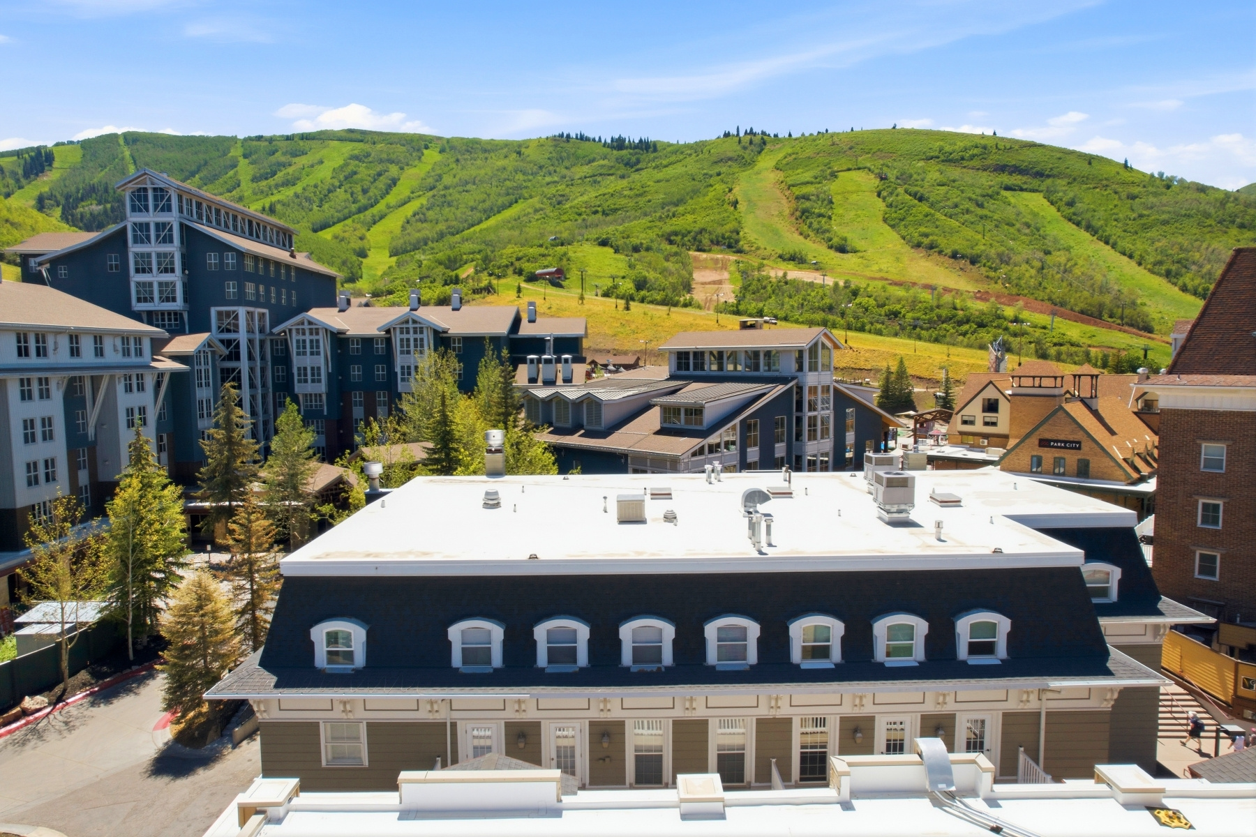 Ski in/Out Turnkey Investment located at the base of Park City Mountain Resort   Rarely available, a one-bedroom/two-bathroom residence at the base of Park City Mountain Resort (next to the Marriott Mountainside Hotel and the Lowell Residences), is ideal for personal enjoyment or as a turnkey vacation rental property.  The condo is offered fully furnished and boasts a generous master bedroom with a large great room, complete with a pullout couch which will accommodate additional guests.  A spacious deck is the perfect place to enjoy an aprs cocktail as you watch the mountain wind down for the night.  Steps from the high-speed six-passenger Payday Lift, the location can't be beat for a ski-in, ski-out condo. Underground parking is included and is provided in the adjacent Lowell condominiums. As an owner, you and your guests will also have use of the fitness facilities, pool, and hot tubs of the nearby Lodge at the Mountain Village per an agreement between the two HOA's.  Surrounded by numerous shops and restaurants for ultimate convenience and luxury. Walk to historic Main Street or take a bus to Deer Valley and around town. Truly, a unique opportunity awaits.
