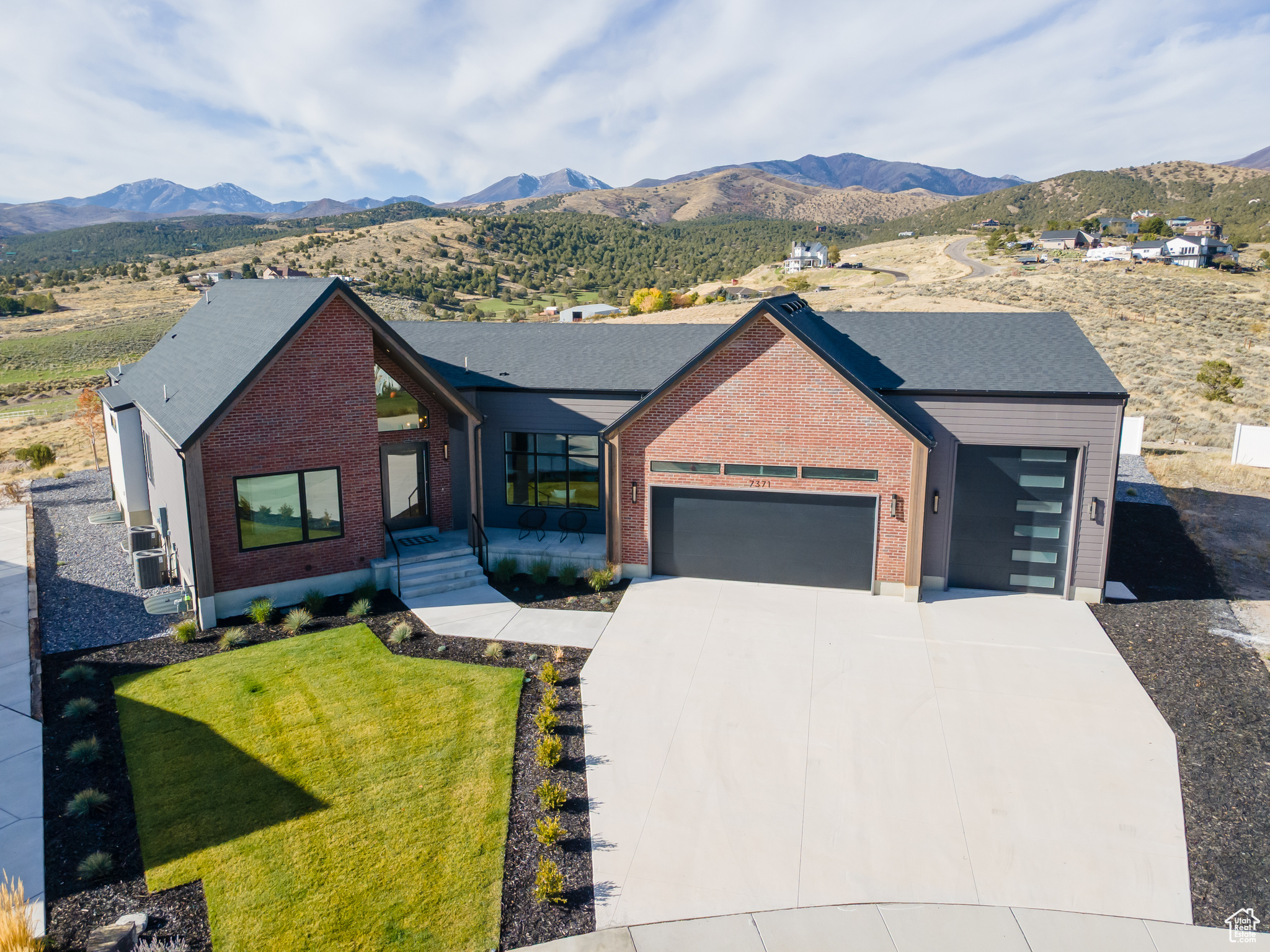 OPEN HOUSE SATURDAY JUNE 13 - 11:00 AM - 2:00 PM.  Discover your dream home at 7371 W Summit Crest Circle. Nestled amidst a prestigious community of luxury homes, this stunning residence offers breathtaking panoramic views of Rose Canyon. Enjoy the serenity of a quiet cul-de-sac location while being just minutes away from all the amenities you desire. This 6-bedroom, 4.5 bathroom home boasts nearly 6,000 square feet of finished living space, providing ample room for comfortable and luxurious living. Accommodate your entire fleet with an oversized garage capable of housing 4 cars or 2 cars and an RV. Experience the pinnacle of culinary excellence with a top-of-the-line appliance package along with a Butler's pantry plus another full kitchen in the basement. Relax and entertain on your private, flat, fully landscaped lot of 0.44 acres along with the peace of mind of a 12 Month Builder Home Warranty. Information deemed reliable, but not a guarantee. Square footage provided as a courtesy only. Buyer is advised to obtain an independent measurement and to verify all information.