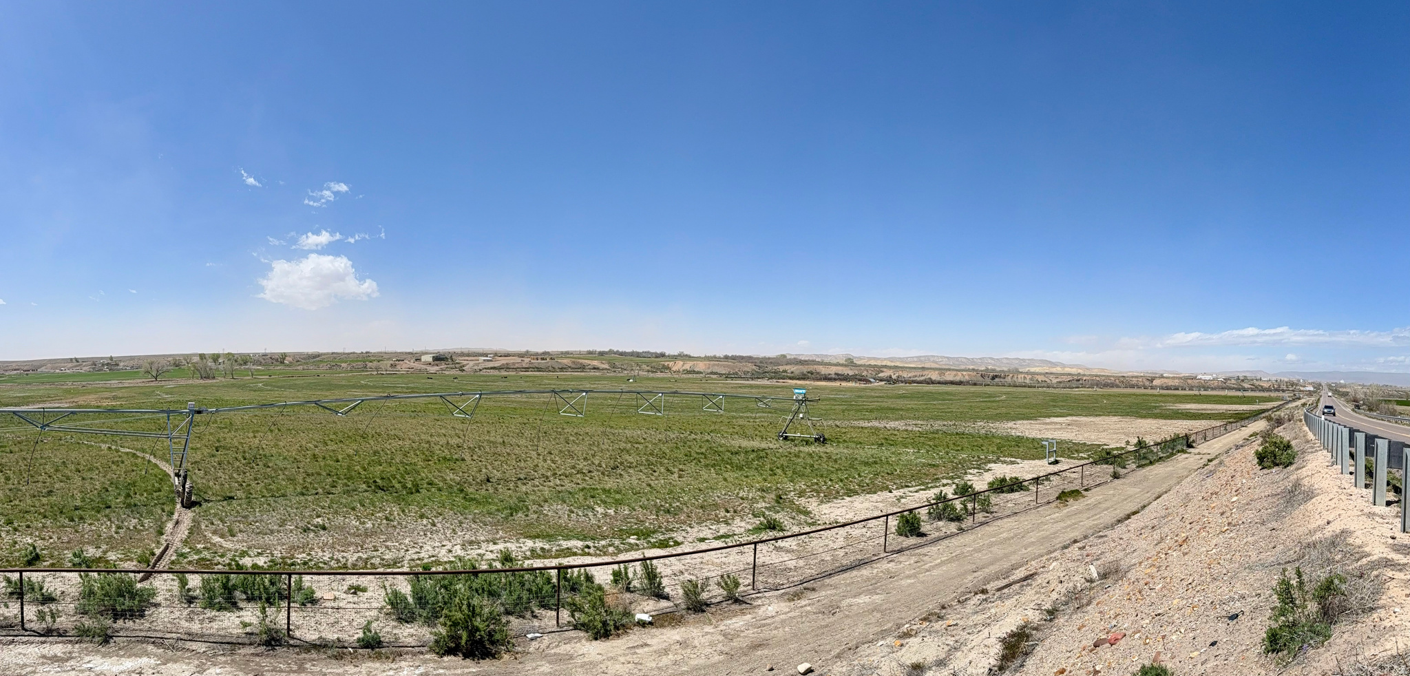 This exceptional irrigated farm property offers a rare combination of water rights, infrastructure, and location that is hard to find in the Uintah Basin. Spanning 93.831 acres, the farm comes equipped with 35 shares of river irrigation company water rights and four pivots, providing efficient, reliable coverage across the ground. Currently planted in a productive pasture blend, the land is ready to generate income from day one, whether you continue grazing operations or transition to hay or crop production. The southern boundary borders Ashley Creek, adding natural beauty, wildlife habitat, and stock water access on the property. With approximately 2,000 feet of Highway 40 frontage, this farm enjoys outstanding visibility and accessibility, making it an ideal candidate for a variety of agricultural or investment uses. Properties like this, with solid water, working infrastructure, and premier highway exposure, rarely come available. Don't miss your opportunity to own a piece of productive Uintah Basin farmland.