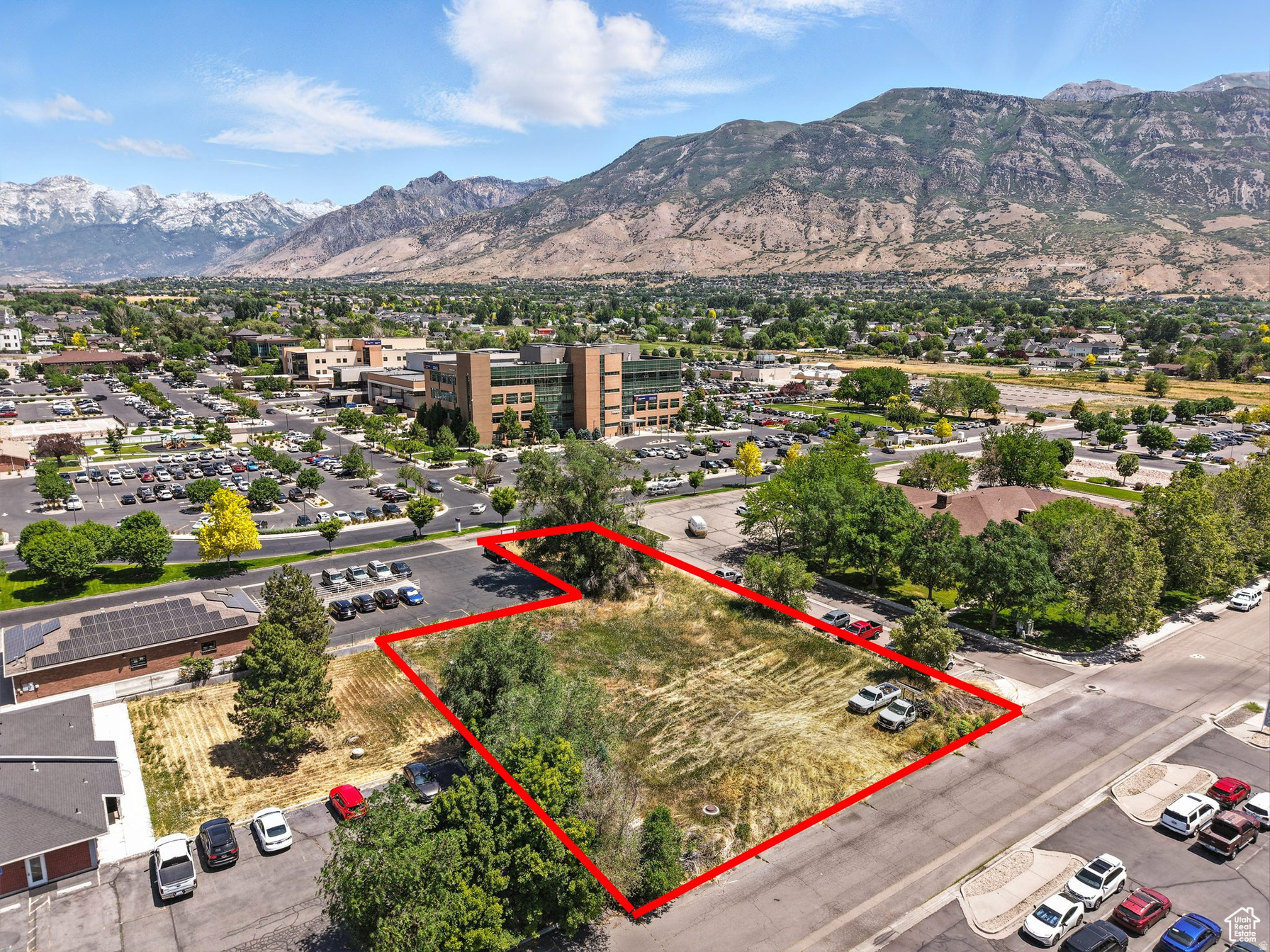 Your plans or ours. Very versatile American Fork commercial lot. We have it plat approved for a planned MEDICAL PROFESSIONAL OFFICE SPACE. Fully engineered plans available with lot purchase PROPERTY OVERVIEW 0.61 acre parcel immediately south of the American Fork Hospital Approved plans: Building Type: Class-A Medical / Professional Office Total Area: 8179 sq ft Stories: 2 Suites: 6 suites across 2 floors Occupancy Type: Group B (Business) Construction Type: Type VB (Fully Fire Compliant) 34 parking bays BUILT FOR MEDICAL EXCELLENCE Purpose-built for healthcare and professional use Non-sprinklered, Type VB per 2021 IBC ADA-compliant with elevator, stairwells, accessible restrooms Generous natural light and modern finishess SUITE HIGHLIGHTS Main Level: 4,090 SF Ideal for urgent care, general practice, or dental Upper Level: 4089 SF Perfect for medical specialists, therapy, administration, high-tech office Divisible floor plans  configure to suit your practice needs LOCATION ADVANTAGES Prime spot off State Street near AF Hospital, Orthetime Orthodontics, and other healthcare clusters Directly across from major retail and residential developments High-visibility frontage with ample on-site parking BUILDING FEATURES Floor-to-ceiling windows in lobby & suites Suite Numbering: 101-104 (Main), 201-203 (Upper) Architectural exterior: stone, wood, metal paneling Shared lobby with branding opportunities