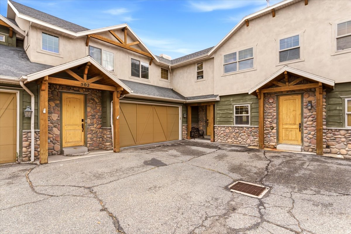 Nestled at the base of Powder Mountain Ski Resort, this well cared for Classic luxury styled modern townhome offers the ultimate four-season mountain lifestyle. Ideally located within a 20-minutes of Snowbasin Ski Resort and even closer to Nordic Valley Ski Resort, outdoor recreation is always within reach. Enjoy living adjacent to the 2nd fairway of Wolf Creek Golf Course, quick access to hiking and biking trails, plus nearby boating, paddleboarding, and water recreation at Pineview Reservoir. The HOA permits short-term rentals, making this an exceptional primary residence, vacation getaway, or investment opportunity.  Inside, the spacious floor plan comfortably accommodates guests, get togethers and features a large movie theater room perfect for entertaining.  Many recent updates including, kitchen and bathroom, custom cedar fireplace riser, custom copper stove vent/hood, kitchenette in the basement, and color selectable lighting throughout among many others. A 2-car garage with a professionally installed epoxy floor and heavy duty ceiling storage racks, offers ample storage for all your mountain gear and storage needs.  A lock-out sweet on the upstairs level with a separate entrance provides creative flexibility to suit almost anyone's needs.  A quiet and secluded backyard with a large patio,  hammock spots and mountain views completes this property for almost any Buyer!
