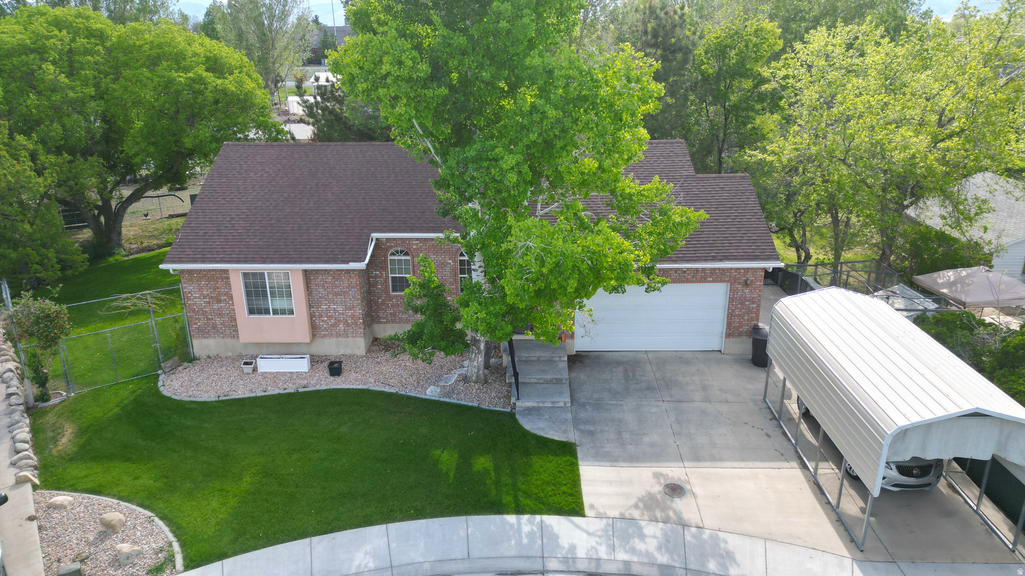 Nestled in a quiet cul-de-sac, this inviting home offers the perfect blend of comfort, charm, and outdoor beauty. The incredible yard is a true retreat, featuring mature trees, a peaceful stream (from run off),  spacious deck, and patio-ideal for relaxing or entertaining family and friends. Located within walking distance to Snow College and the Ephraim Temple, this property combines convenience with a serene setting. Whether gathering indoors or enjoying the beautiful outdoor spaces, this home is designed for making lasting memories.