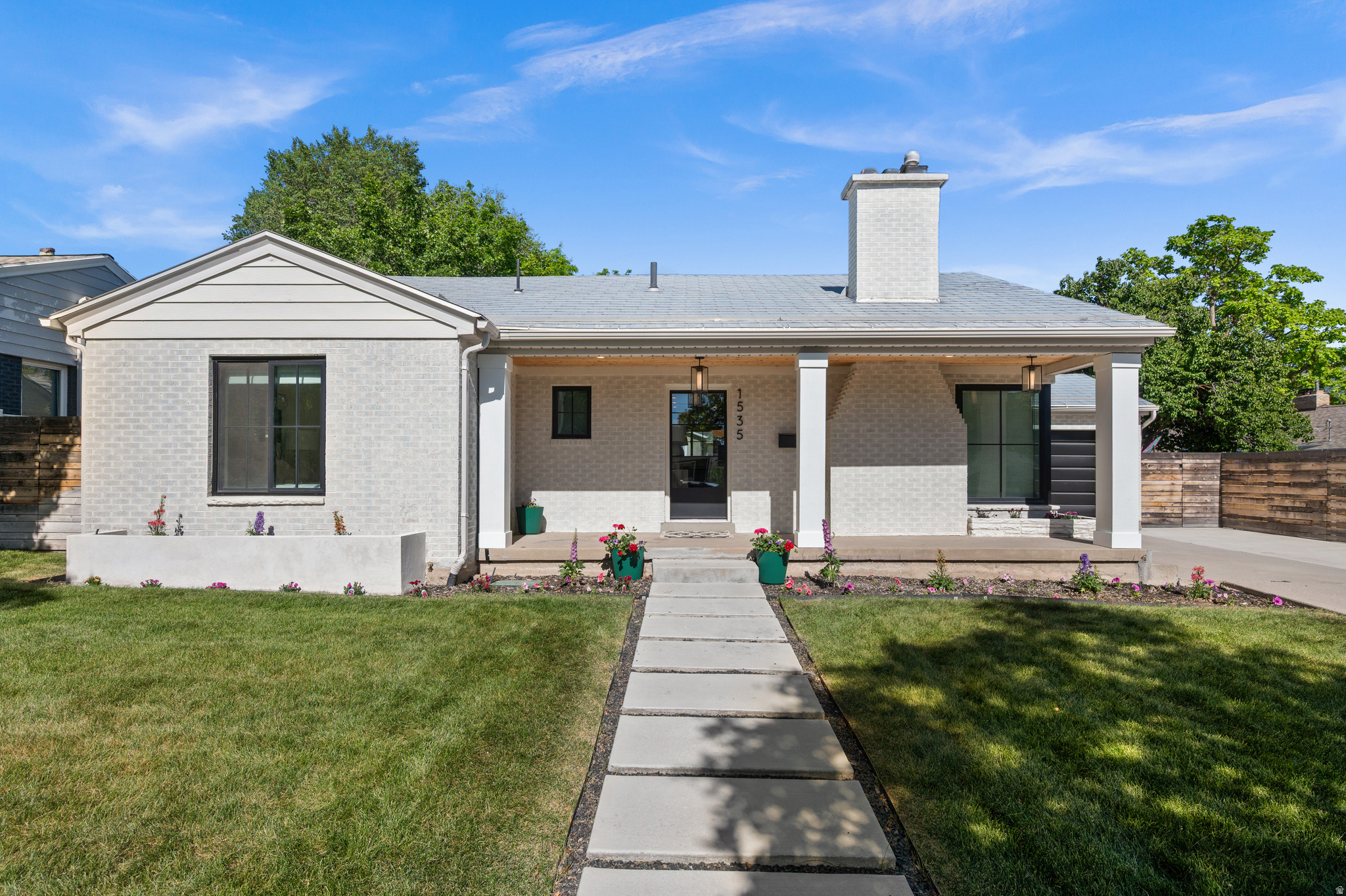Modern yet inviting 4bedroom home with 2 full baths and 1 half baths, elegantly updated throughout with highend finishes and thoughtful upgrades. The bright, open kitchen showcases quartz countertops, custom tile backsplash, Wolf and SubZero appliances, refinished cabinets and hardwood floors, plus an eyecatching tile accent wall in the dining room. Bathrooms feature marble counters with an updated vanity in the downstairs bath. Other enhancements include new doors and hardware, new bathroom accessories, partition glass and rebuilt closets upstairs, a refreshed laundry/powder room, a new front door and rear Dutch door with keypad entry, a refinished fireplace with new plaster surround, a fully sprinklered system, Sonos surround and framed TV installation, instant hot water heater installed, updated plumbing where noted, driveway expansion with a concrete pad at the side of the garage, improved front landscaping and stepping stones, natural woven shades and window treatments, and fresh paint throughout. Located in a highly desirable area near 15th & 15th, Sugar House, Foothill Village and the University of Utah, this home offers easy access to shops, dining, parks and campus - a perfect blend of city convenience and neighborhood charm. Contact for showing and more details