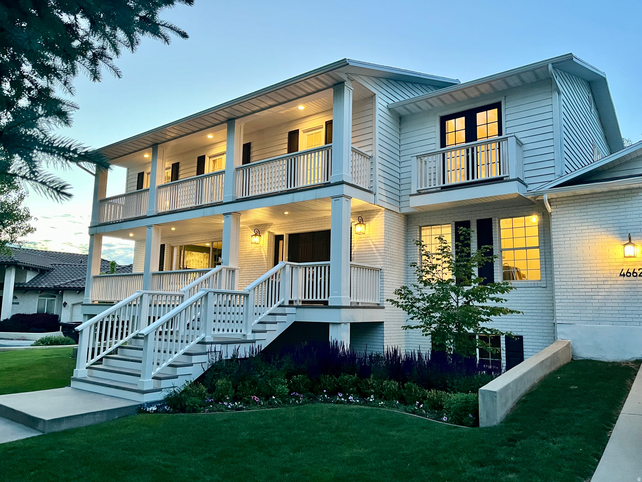 Stunning Charleston-Style Home in Provo Foothills:  Rarely does a home so perfectly balance distinct architectural character with modern luxury and exceptional income potential or generational living. Situated at the end of a cul-de-sac in Provo hills, this estate offers a highly coveted flat street and driveway that sets it apart from typical foothill properties. Boasting a captivating Southern Charleston-style exterior that is a unique find in Utah, the residence features classic white painted brick, contrasting shutters, a full-length front porch, and a second-story deck and balcony, this residence delivers unforgettable curb appeal framed by mature trees and pristine landscaping.    Historic Charm Meets Modern Design:   Inside, the home seamlessly blends timeless original elements with chic modern updates. The main living areas feature gorgeous, original hardwood floors that add warmth and character. Designed for both daily living and elegant entertaining, the main floor offers a formal dining room, a formal living room centered around a cozy fireplace, and a separate, inviting living room featuring its own fireplace with custom built-in shelving.  The updated chef's kitchen is equipped with premium Bosch appliances and features floor to ceiling cabinetry. Throughout the home, perfectly framed windows highlight beautiful views of the surrounding mountains and Utah lake, creating an incredibly intimate and serene home environment.    Backyard Oasis and Indoor-Outdoor Living:   Situated on a rare, completely flat foothill lot, the outdoor space offers true usable yard space with no steep drop-offs or cliffs. The property is a private sanctuary with no rear neighbors and a spectacular indoor pool pavilion. The indoor pool and swim spa area features an upgraded pump, a fully operational heater, and brand-new windows that can be completely removed to open the space to the elements, creating a true indoor-outdoor recreation experience. The lush exterior grounds are beautifully framed and complemented by mature fruit trees.    Main House, Basement Suite, and Mother-in-Law Apartment offering unmatched versatility:   With a total of 8 bedrooms and 4.5 bathrooms, this property offers rare multi-generational versatility and rental potential across three distinct spaces.    The Main House: Features light-filled upper-level bedrooms and beautifully updated living areas.    The Basement Suite: A bright daylight basement equipped with its own full kitchenette, living room, 2 bedrooms, and 1 bathroom, perfect for extended guests.    The Mother-in-Law Apartment: A semi-attached, ~2200 Sq Ft, 2-bedroom and 1 bath unit with ADU potential; featuring its own independent water and electrical meters, a private entrance, and high-end HVAC with independent thermostats in each room.    A World-Class Location for Skiers and Outdoor Enthusiasts:   For avid skiers, winter sports enthusiasts, and outdoor lovers, this location is paramount. You are a mere 14 minutes from your driveway to the parking lot at the world-renowned Sundance Ski Resort, making fresh powder days effortlessly accessible.  In the warmer months, enjoy direct trailhead access to the Bonneville Shoreline Trail and Bridal Veil Falls without ever having to cross a road. This premier trail network also leads directly to the upcoming, world-class Vesper Amphitheater breaking ground next year, putting elite music and culture right in your backyard.