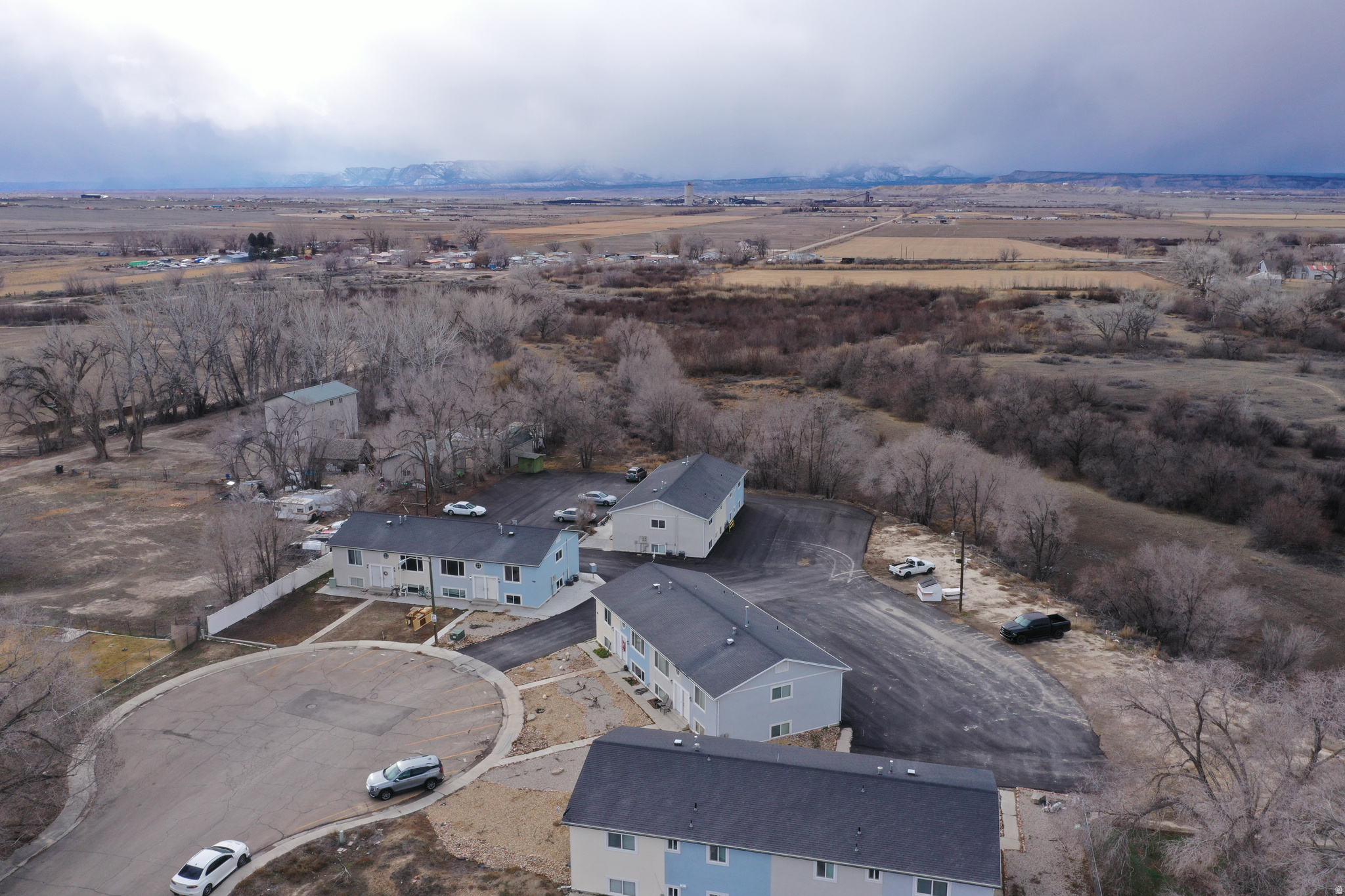 Excellent multi-family investment opportunity situated on 1.60 (parcel 1b-231-12 & 1b-231-11) acres 16 units total in Wellington. This well-maintained property offers strong rental income with room for long-term appreciation. Each unit rents for $850 per month Tenants pay $110 per month in utility reimbursement to the owner's property manager for Wellington City utilities (water & garbage) Tenants place Rocky Mountain Power and Enbridge Gas in their own names, reducing owner utility exposure. Newer stucco exterior and asphalt driveway. 8 units have received updates within the past 3 years, including: 8 Central Air Units New carpet, Fresh interior paint, Updated cabinets (in select units). Washer and dryers are tenant-owned. 4 video walkthroughs of different units available upon request. Please do not disturb the tenants.  This property presents a solid opportunity for investors seeking stabilized cash flow with improved exterior and interior updates already completed.  Square footage figures are provided as a courtesy estimate only and were obtained from Carbon County .  Buyer is advised to obtain an independent measurement.