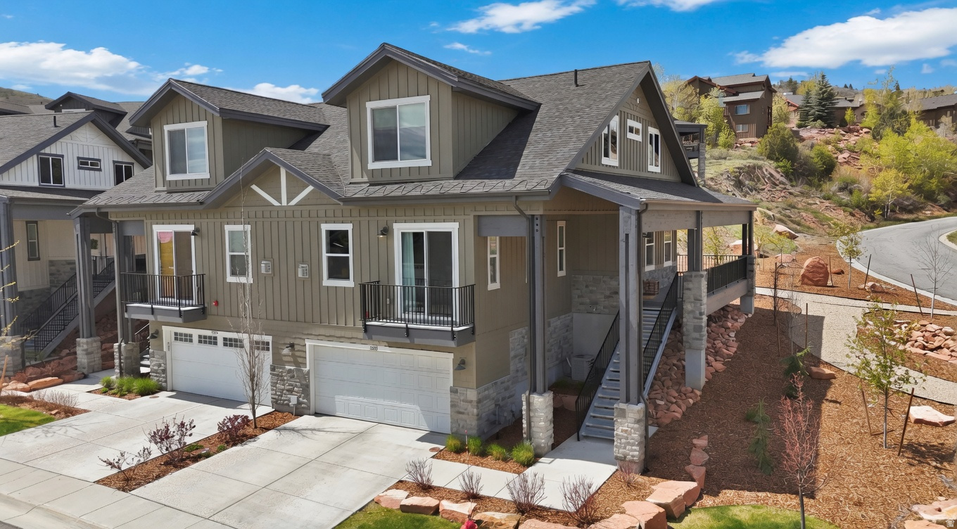 Discover this exceptional end-unit townhome in the highly desirable Quarry Springs community of Pinebrook/Summit Park, Park City. One of the best units in the neighborhood, it features one of the largest wrap-around balconies in the complex-over 500 square feet of outdoor living space with sweeping mountain views-plus abundant natural light that fills the bright, open interior. The main-level primary suite offers convenient balcony access and a large en-suite bathroom. Perfectly located right next to the community pool, hot tub, and clubhouse with extra guest parking, this premium residence offers a 3-day minimum rental period, making it an outstanding income-producing vacation property in a walkable enclave just steps from Quarry Village shops, dining, trails, and quick access to Park City Mountain, Deer Valley, and Salt Lake City. Ideal as a primary home, second residence, or turnkey rental.