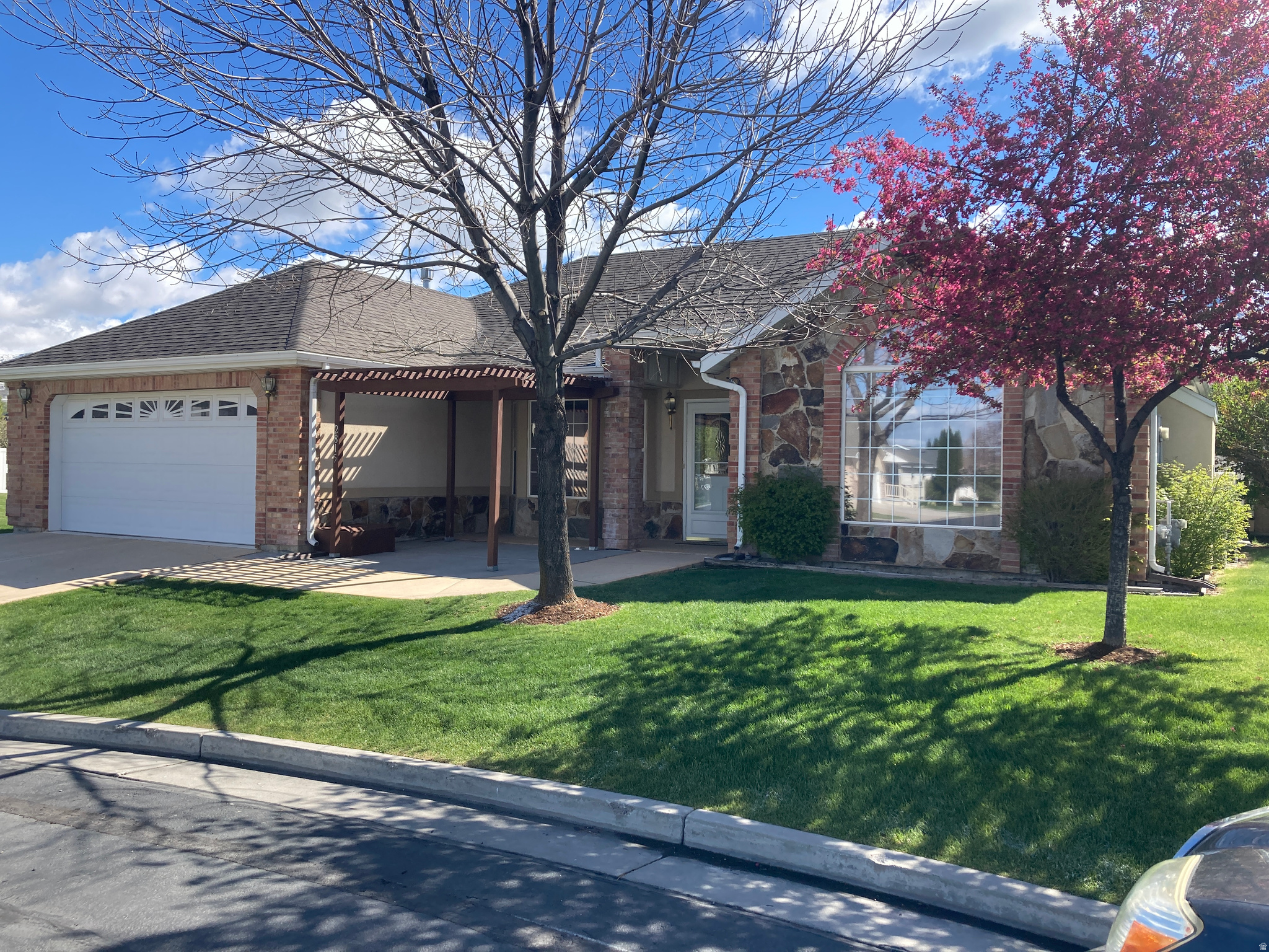 Enjoy easy, single-level living in this move-in ready home located in a desirable 55+ community in North Logan! Built in 2000 and thoughtfully maintained, this 3-bedroom, 2-bathroom home offers 1,495 sq ft of comfortable living space, complete with a cozy fireplace. Situated on a prime inside corner lot, the property features a peaceful backyard retreat with a covered patio-perfect for relaxing and taking in the beautiful mountain views. Additional highlights include a 2-car garage, powered workshop/shed, garden spot, and central A/C for year-round comfort. Conveniently located near schools, parks, shopping, dining, and Utah State University, this home offers both comfort and accessibility. Don't miss this fantastic opportunity!