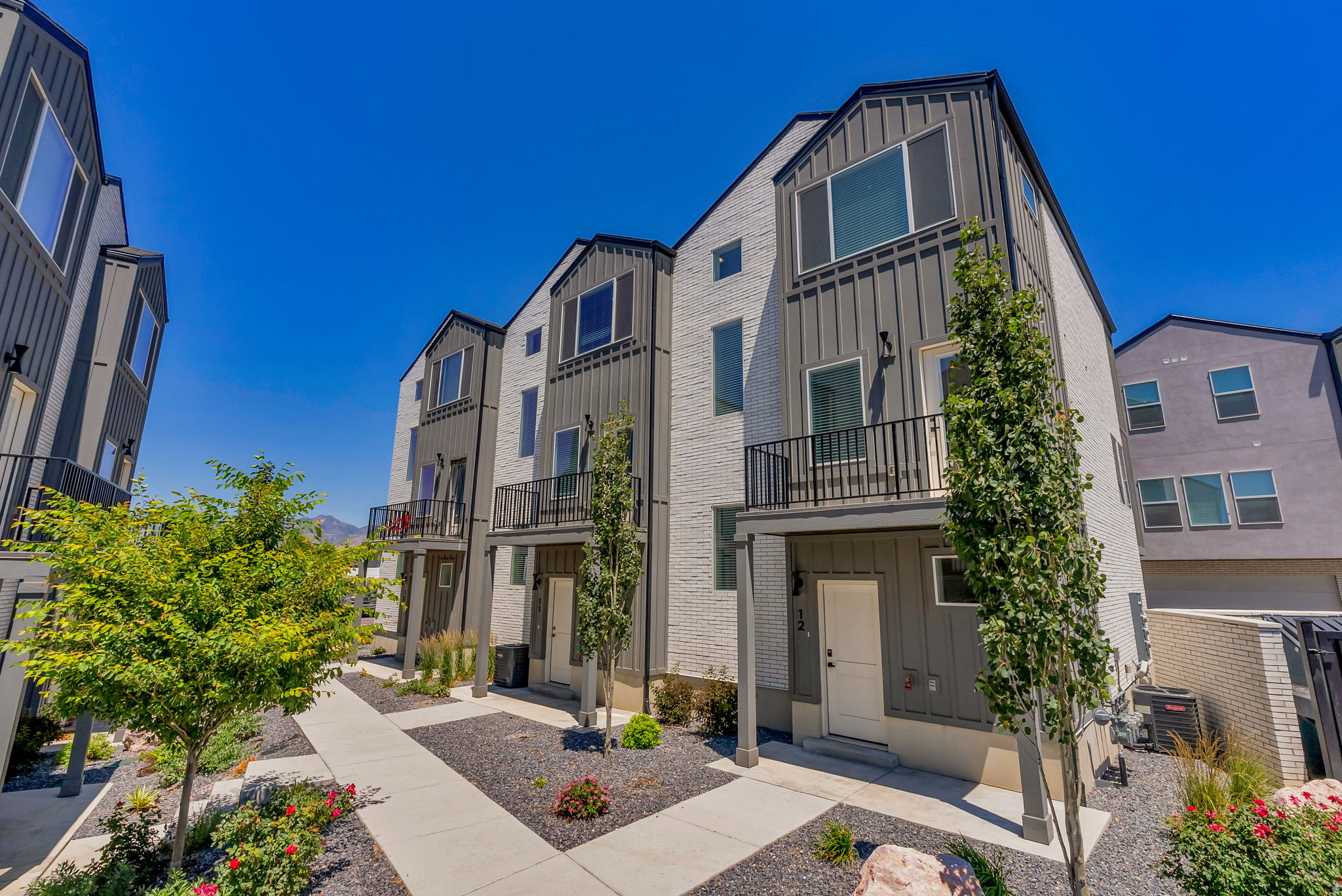 TURN KEY - New 3 story townhome units - individually platted. Buy 2 units, 3 units or up to 16 units. Total units for sale. Priced 35k below appraisal/unit. Master suite with  3 bedrooms and 2 baths up.  Second story has open great room w/kitchen, deck/patio per each unit and 1/2 bath. Two car garage, with views of the lake.  Rented at $1,950 per month per unit. NOTE: HOA $150 per month includes water, sewer and garbage/maintenance.    Easy to manage and own
