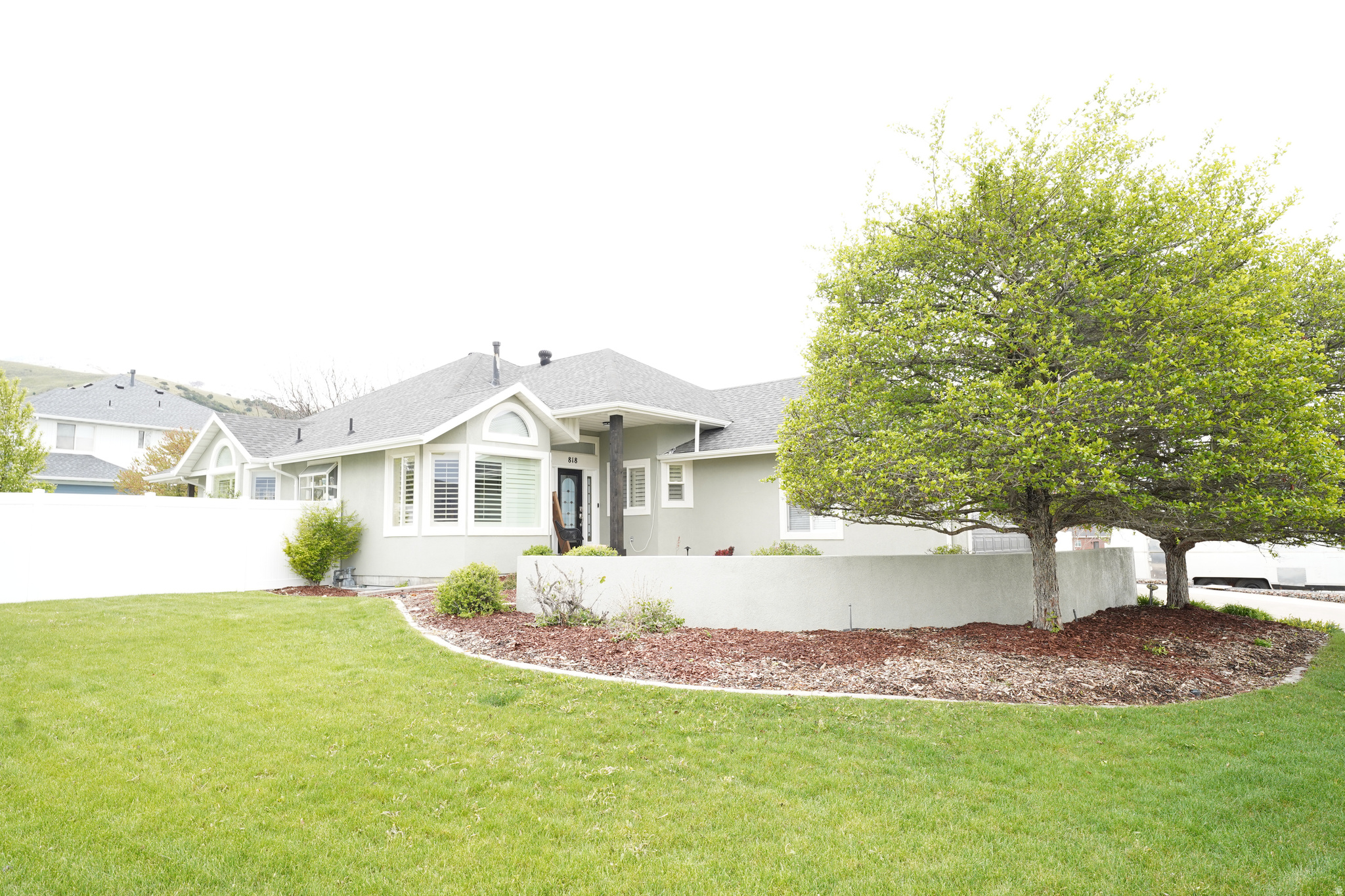 This Beautiful Rambler is nestled in a prime location that sits up above Birch Creek Golf Course. This updated home has such a comfortable feel. The open great room is bright and fresh with new paint and carpet and is such a perfect entertainers house.It features a pool table, a wet bar in the basement, an executive office, bookshelves for the reader in you, and 2 fireplaces to cozy up to (one on each level), a walk out basement and a kitchen that will make any chefs dream come true. The primary suite has direct access to a spacious deck that is perfect for relaxing and enjoying the beautiful mountain views. The fully fenced backyard provides privacy and space for all to enjoy.The office upstairs can be converted back into a bedroom.Schedule a time to come and look at this beauty!