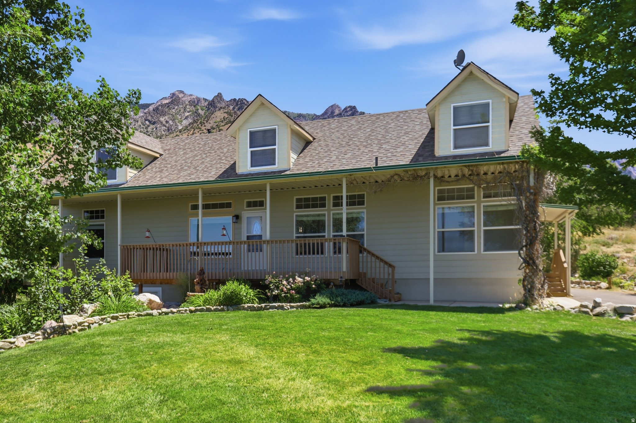 Remarkable views surround this beautiful two-story home with a full basement, situated on 1.4 acres in desirable Willard! Enjoy breathtaking sunsets over Willard Bay to the west and stunning mountain range views to the east from nearly every angle of the property. Interior Features: This well-maintained home offers an updated kitchen, spacious living areas, large bedrooms, abundant storage, and room to easily convert additional space into more bedrooms if desired. The fully finished basement includes a wet bar that could function as a second kitchen and features its own walkout entrance, creating excellent potential for multi-generational living or guest quarters. Additional upgrades include a high-efficiency furnace (2022), tankless water heater, water softener, new dishwasher, and a brand-new roof installed in 2025. As an added bonus, the home includes a pool table, kitchen table and chairs, and select furnishings. Exterior Features: Relax on the covered front porch while taking in the incredible views. The property features a beautifully landscaped yard with a sprinkler system, fenced backyard, and a 24' x 36' (approximately 860 sq. ft.) insulated steel shop complete with wood stove, gas heater, 220 power, and ample workspace. With panoramic views in every direction, this exceptional property offers the perfect blend of comfort, functionality, and country living. Don't forget to check out the video and 3d Tour links Buyer to Verify All Information.