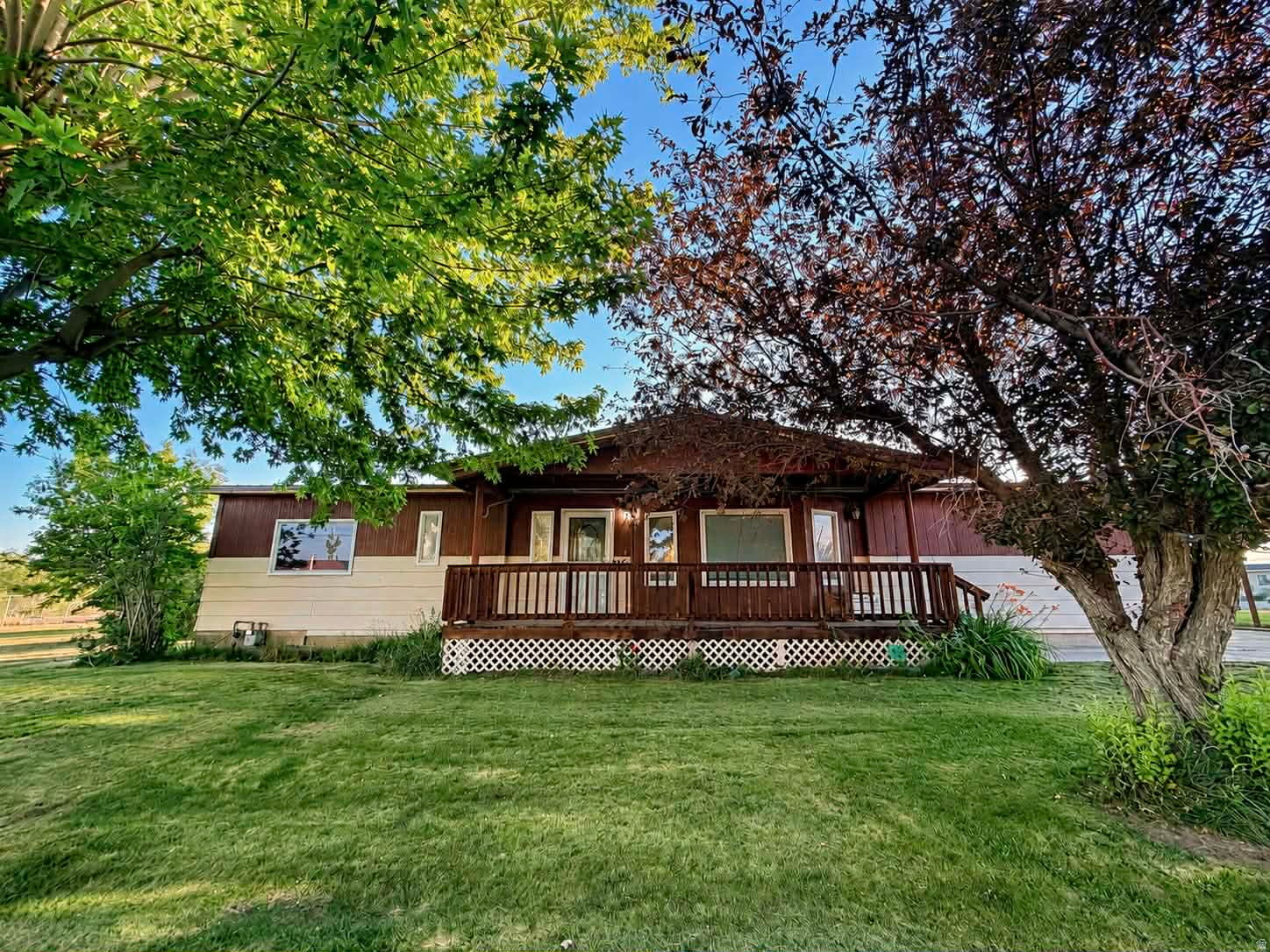 Looking for space, functionality, and small-town living? This 3-bedroom, 2-bath home sits on approximately 2 acres in Cleveland and offers the kind of setup that's becoming increasingly hard to find. With 1,611 square feet, a new metal roof, new plumbing, a water heater less than a year old, and a new energy-efficient furnace, many of the major updates have already been taken care of.  Inside, you'll find a spacious open-concept layout featuring a large living area with rustic accents, a beautifully updated kitchen, dedicated office space, remodeled bathrooms, and a cozy wood-burning stove. The inviting floor plan offers both comfort and functionality for everyday living.  Step outside and enjoy the best of country living. The property is dotted with mature shade trees and fruit trees, creating a peaceful setting with plenty of room to relax and enjoy the outdoors. A large detached workshop/garage, additional outbuildings, covered parking, RV parking, and abundant space for equipment, hobbies, animals, or recreational toys make this property incredibly versatile. Whether you're a mechanic, woodworker, hobby farmer, or simply someone looking for room to spread out, this property offers endless possibilities.  Square footage figures are provided as a courtesy estimate only and were obtained from County Records .  Buyer is advised to obtain an independent measurement.
