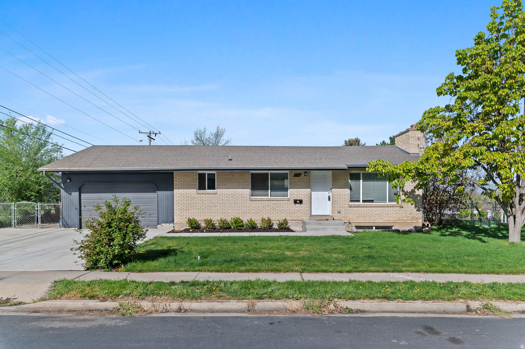 Welcome to this charming and versatile home nestled in a beautiful neighborhood in Southeast Provo, with built-in income potential! Upstairs features 2bdrm/1 ba with a bright, comfortable living space. Downstairs offers a legal basement apartment with 2 bd/1ba -perfect for renters to help offset your mortgage. Enjoy a spacious quiet yard with a fully fenced backyard, ideal for relaxing or entertaining. Live upstairs and let rental income work for you-great opportunity you don't want to miss!   Square footage figures are provided as a courtesy estimate only and were obtained from county records.  Buyer is advised to obtain an independent measurement.