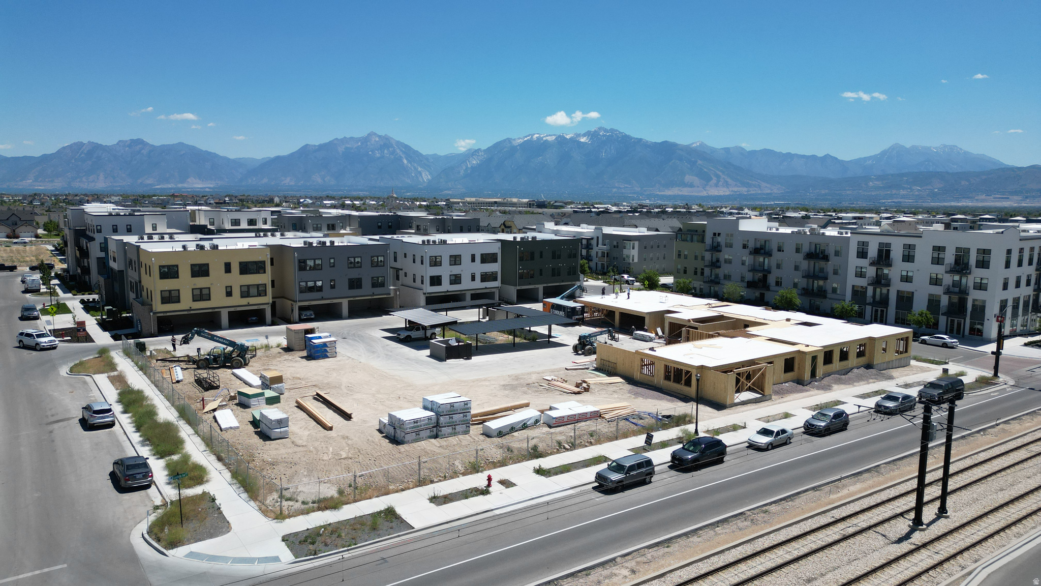ELEVATOR + 360 VIEWS of Downtown Daybreak and the Wasatch Mountains from the rooftop deck make these condos truly stand out. Newly designed floorplans showcase upgraded features throughout, delivering the perfect blend of style, comfort, and convenience. Located in the heart of Daybreak-just steps from dining, shops, parks, and TRAX. Each home offers a bright open layout with sleek finishes, modern design, and elevator access to all four floors. Expansive windows provide stunning views of Downtown Daybreak and the Wasatch Mountains from inside the condos, filling the spaces with natural light.