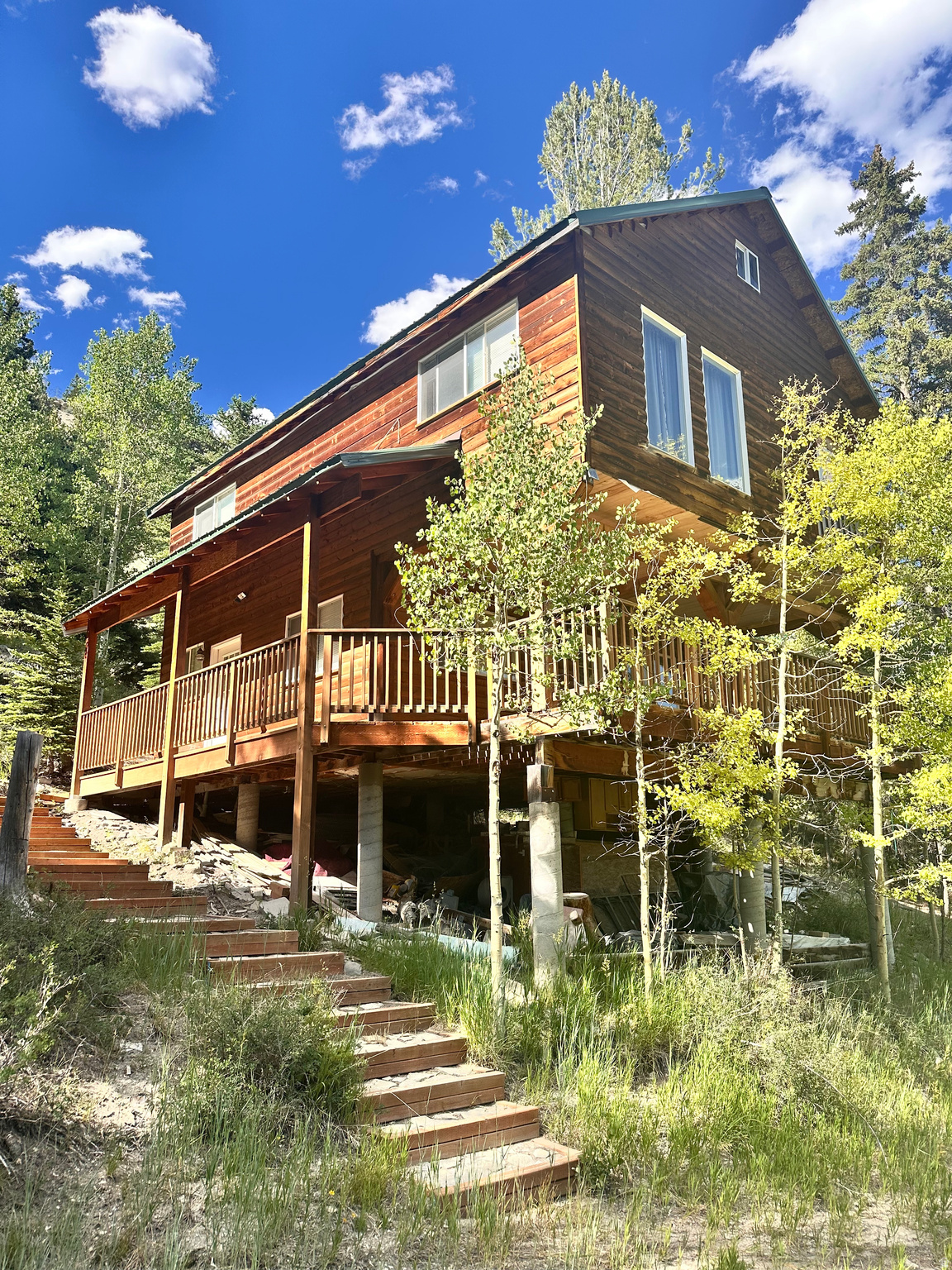Escape to your own private off-grid mountain retreat on 10 acres surrounded by towering pines, peaceful forest views, and cooler mountain temperatures. Spend your days exploring the outdoors and your evenings gathered around the fire pit or staying cozy by the wood-burning stove. Endless potential to expand your off-grid lifestyle, the cabin features wiring for electricity, solar or generator hook-ups, unfinished attic ready to become additional sleeping space or a loft. Winter access is available by tracked vehicle or snowmobile. Located just two hours from the Salt Lake area, this is the perfect place to unplug, relax, and create lasting memories and enjoy your summer nights under the stars.