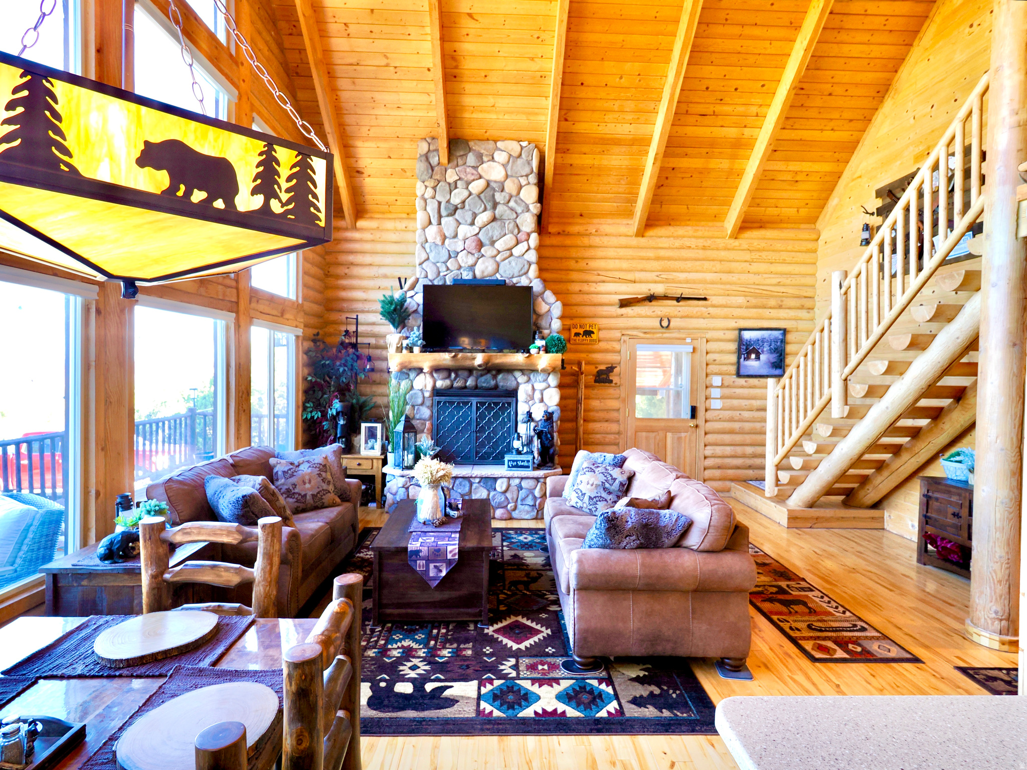 Escape the hustle and bustle in this darling log cabin nestled in the trees. Enjoy breathtaking mountain views and year-round access across all four seasons. This extraordinary, turn-key retreat near Brian Head Ski Resort offers quiet serenity, outdoor adventure, and consistent income potential. *Highlights: 1.Adventure: Ski Brian Head in winter or spend summer afternoons on the numerous ATV trails right outside your door. 2. Serenity: Relax with stunning sunrises and sunsets from your deck. 3. Off-Grid: Owned solar (2022) and private water rights. 4. Ready for You: Sold fully furnished. This mountain escape is ready for your immediate enjoyment.  It's also perfectly set up for short-term vacation rental or serve as a consistent long-term rental investment. Schedule a showing today.