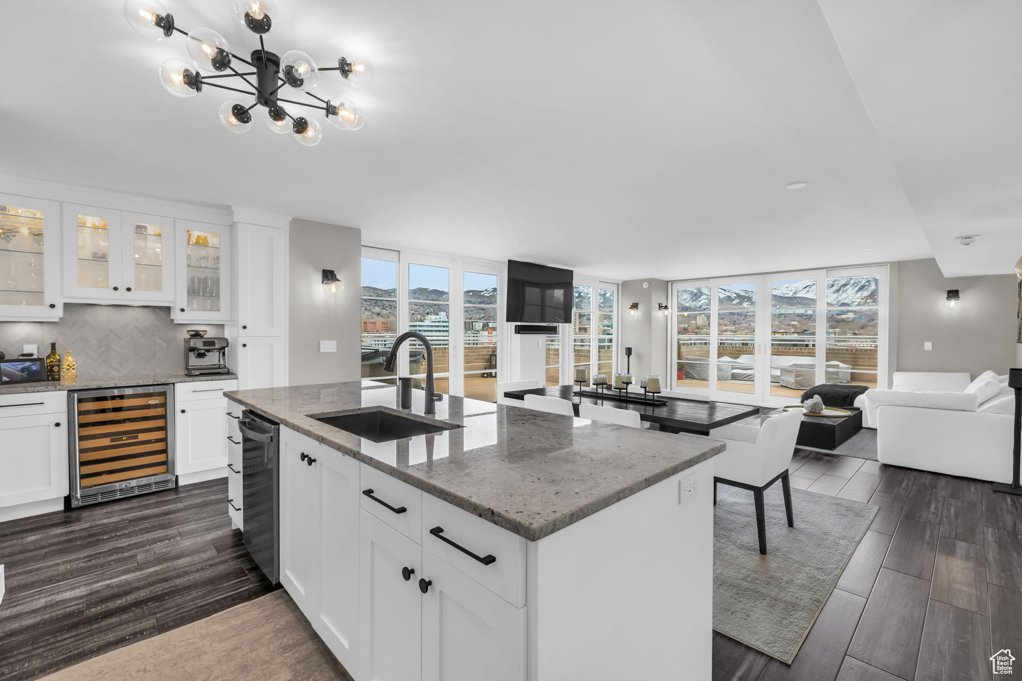 Amazing penthouse in the heart of Salt Lake City. Floor to ceiling windows and doors leads you to a massive 950 Sf deck not included in the total sqft for great outdoor entertainment. The outdoor living space offers incredible views of the mountain and the city. The home has been fully updated. The kitchen has stainless steel appliances, separate pantry Master bedroom has large floor to ceiling windows to give you unobstructed views.