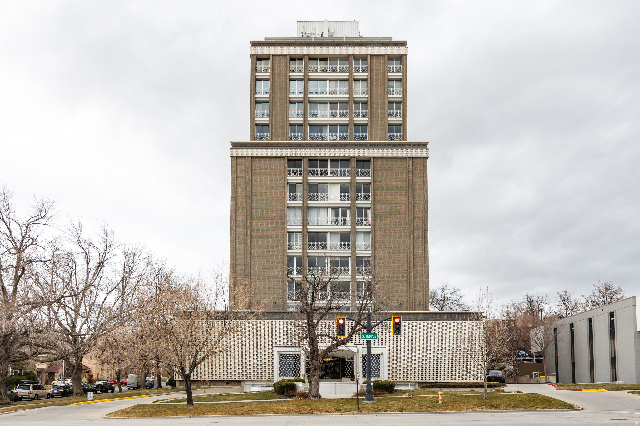 This beautiful condo in the historic Bonneville Tower on South Temple is a welcome find. At just over 1,100 square feet, there's plenty of room here to kick up your feet, and given the many updates, it won't be due for a change-up anytime soon. A recent remodel included a fully updated kitchen, complete with a large island and small bar area-open to the primary living space, the result is a space that's ideal for gathering. And, thanks to the wall of west-facing windows, you'll be in a prime position to take in the sweeping views of the Avenues, our Capitol building, downtown Salt Lake City, and every last one of our incredible sunsets. Two bedrooms each come with their own views and ample closet space, and both bathrooms have been updated and modernized. Built in 1964, the Bonneville building is an iconic piece of mid-century architecture in our city, and perched at the intersection of 800 E. and South Temple, residents here have equally easy access to the University area, the Avenues, and downtown proper, so you won't be wanting for great dining options, walkable streets, or entertainment. A pool on the 5th floor of the building means your summer afternoons are squared away, and a dedicated spot in the garage lends itself to absolutely NO snow-scraping in the cold months. All told, a quintessential spot in the city with all the perks you could ever need. Square footage figures are provided as a courtesy estimate only.  Buyer is advised to obtain an independent measurement.