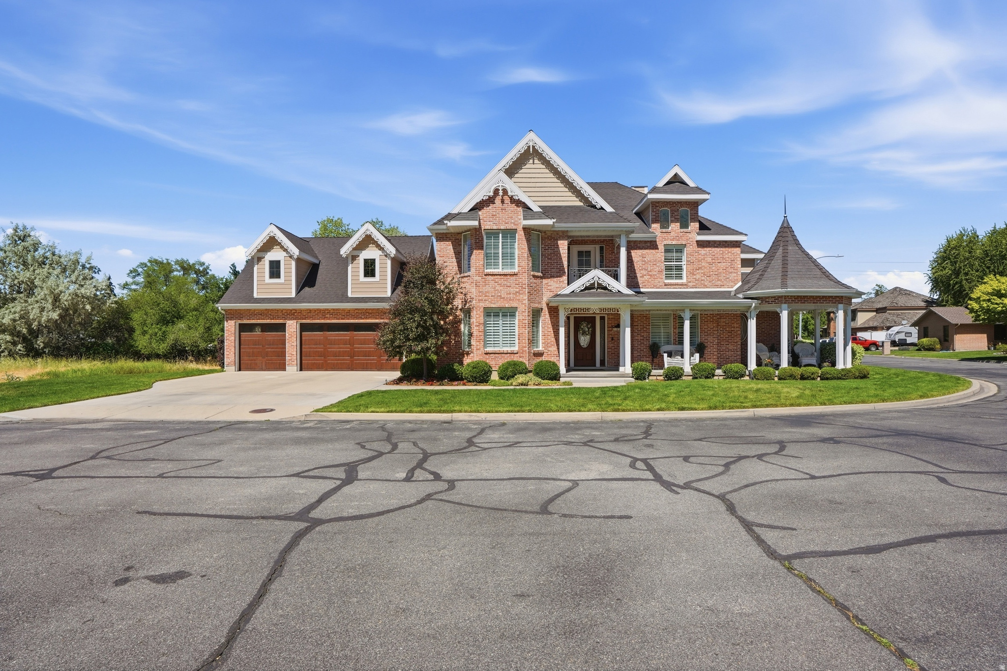 Timeless Victorian-inspired architecture gives this exceptional corner lot home enduring charm and curb appeal. Crafted with reclaimed brick salvaged from an actual historic Victorian building, the residence blends old world character with thoughtful design and quality craftsmanship. Abundant natural light fills the interior, creating warm and inviting living spaces throughout. The spacious yard offers plenty of room to relax, entertain, and enjoy the outdoors.  All the square footage is above ground with no basement.  One of the home's most treasured features is its peaceful setting and wonderful neighborhood atmosphere. Quiet streets, scenic bike paths, and walking trails create an ideal environment for an active lifestyle while maintaining a sense of tranquility. Everyday conveniences are close at hand, with Costco less than a mile away, The stadium within walking distance, and Sundance Resort just 10 minutes away. Designed with entertaining in mind, this home offers the perfect setting for hosting gatherings, celebrating special occasions, or simply connecting with family and friends. The welcoming front porch was thoughtfully created as a place to sit awhile, sip lemonade, and enjoy conversations with neighbors as the day unfolds. This is more than a home.  It's a classic lifestyle defined by beauty, community, convenience, and timeless appeal.    Square footage figures are provided as a courtesy estimate only and were obtained from tax data .  Buyer is advised to obtain an independent measurement.
