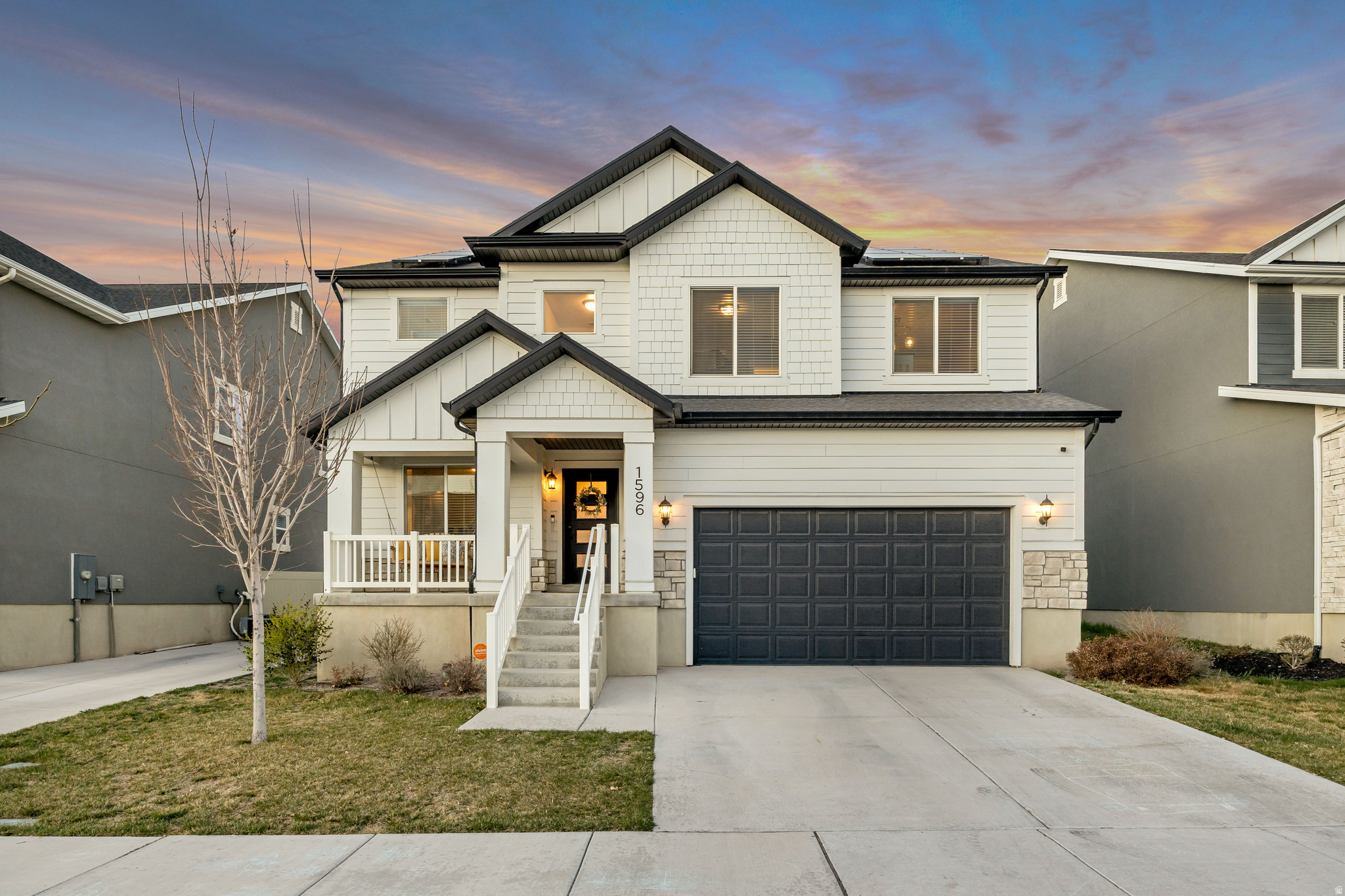 ASK US HOW YOU CAN RECEIVE UP TO $5k towards closing costs when purchasing with our preferred lender! Welcome Home - this beautifully updated 6-bedroom, 3.5-bath home is located in the highly sought-after Quailhill neighborhood of Saratoga Springs. From the moment you step inside, you'll appreciate the light-filled, open layout and fresh updates, including new paint and carpet throughout.  The spacious two-story great room, anchored by a cozy fireplace, creates a warm and inviting space that's perfect for gathering with family and friends. The kitchen is both functional and stylish, featuring stainless steel appliances, a gas range, a large walk-in pantry, and plenty of counter space for everyday living and entertaining.  Upstairs, the primary suite offers a relaxing retreat with an en-suite bath complete with a separate tub and shower. The fully finished lower level adds incredible versatility, with two additional bedrooms, full bath, stackable washer/dryer hookup, large family room with its own fireplace, and a full second kitchen, making it ideal for guests, multi-generational living, or an in-law suite.  Step outside to a beautifully fenced backyard with plenty of space to relax or play, including a large patio with exterior lighting-perfect for evening gatherings. You'll also enjoy the added benefit of a tankless water heater and fully paid-off solar panels, helping reduce energy costs while adding long-term value.  Conveniently located near shopping, dining, and entertainment, this home offers the perfect blend of comfort, functionality, and lifestyle. Don't miss the opportunity to make it yours. Square footage is provided as a courtesy estimate only and was obtained from county records; buyers are advised to obtain an independent measurement.