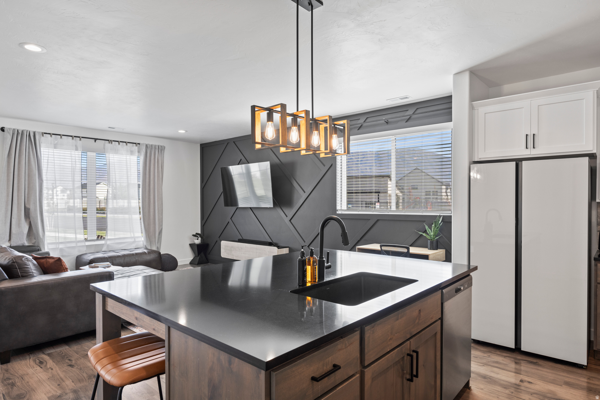 Wake up to mountain views in this well-appointed American Fork townhome. Corner lot, granite countertops, open great room, and a patio made for relaxed evenings. Community pool, pickleball, and playground steps away. Furniture negotiable. Agent owned. Must have approved showing.