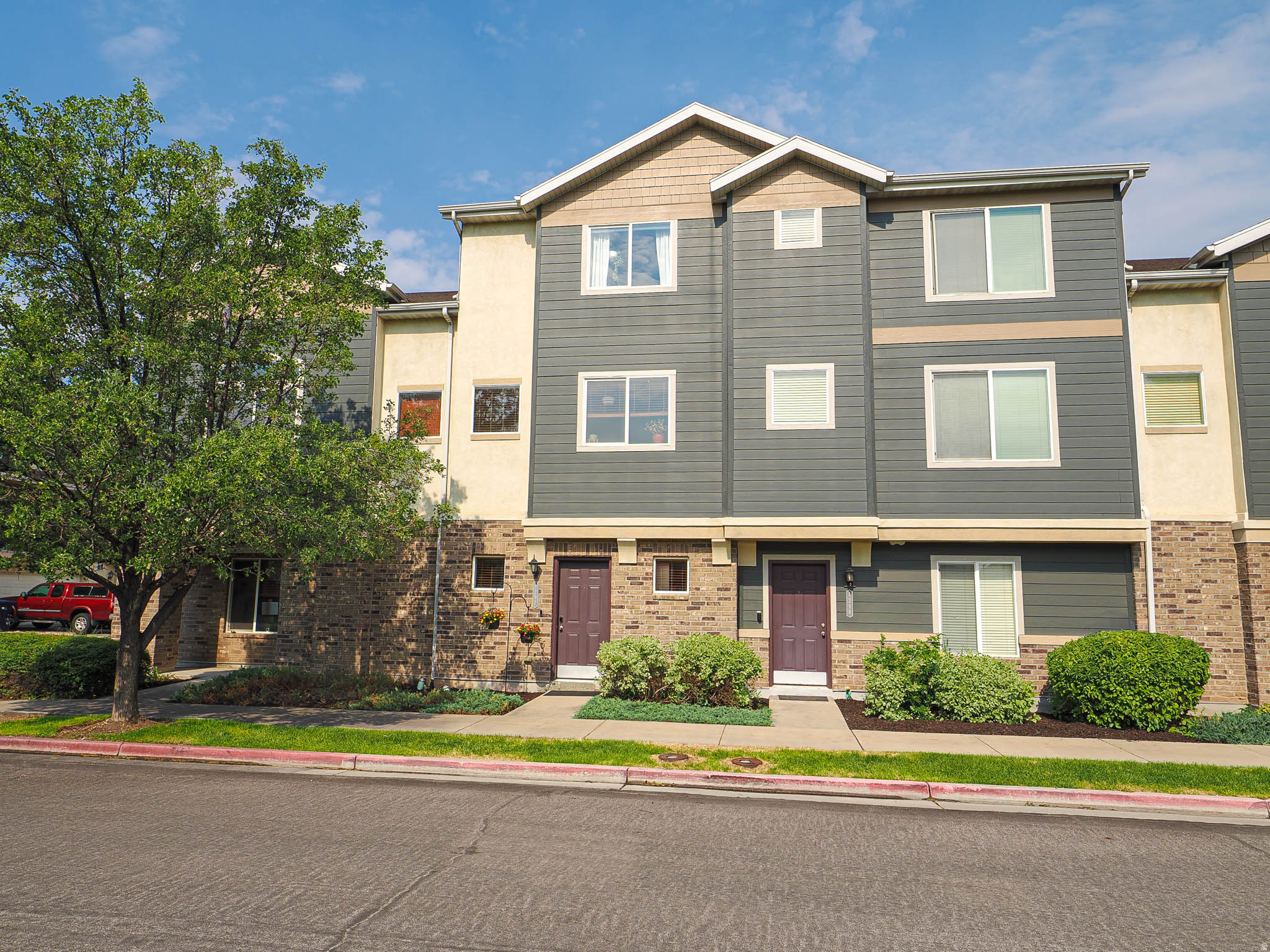 ***OPEN HOUSE SATURDAY 6/27/26 2:00 PM TO 4:00 PM*** SELLER REQUIRES 2 HOUR NOTICE TO SHOW*** Welcome home to this beautifully maintained 2-bedroom, 2.5-bath townhome offering a functional layout, mountain views, and access to exceptional community amenities! Step inside to an inviting entryway featuring a coat closet, direct access to the attached tandem 2-car garage, and stairs leading to the main living area. Upstairs, you'll find a bright and open great room with new LVP flooring that flows seamlessly throughout the space. The well-appointed kitchen offers updated quartz countertops, updated backsplash and lights, as well as ample cabinetry, a peninsula island, a dedicated dining area, and access to a covered deck, perfect for unwinding after a long day. A convenient half bathroom is also located on this level. The upper floor features a spacious primary suite complete with a large walk-in closet, private en-suite bathroom, and even enough room for a small home office setup. An additional bedroom also includes its own walk-in closet and en-suite bathroom, providing privacy and comfort for guests or roommates. Laundry is conveniently located upstairs between the bedrooms. Residents enjoy access to outstanding community amenities, including a clubhouse with a TV room, foosball table, pool table, and fitness center. Outside, take advantage of two pools, a hot tub, dog park, basketball court, and playground along with access to the Porter Rockwell trail, a 9-mile walking and biking trail that begins right in the neighborhood. . Perfectly positioned in a highly convenient Sandy location, this townhome is just minutes from top-rated schools, popular restaurants, shopping at South Towne, America First Field, and more. With quick access to I-15, commuting throughout the Salt Lake Valley is a breeze while still enjoying all the amenities and conveniences right outside your door. Seller will need a leaseback until September 1st AGENTS - READ AGENT REMARKS