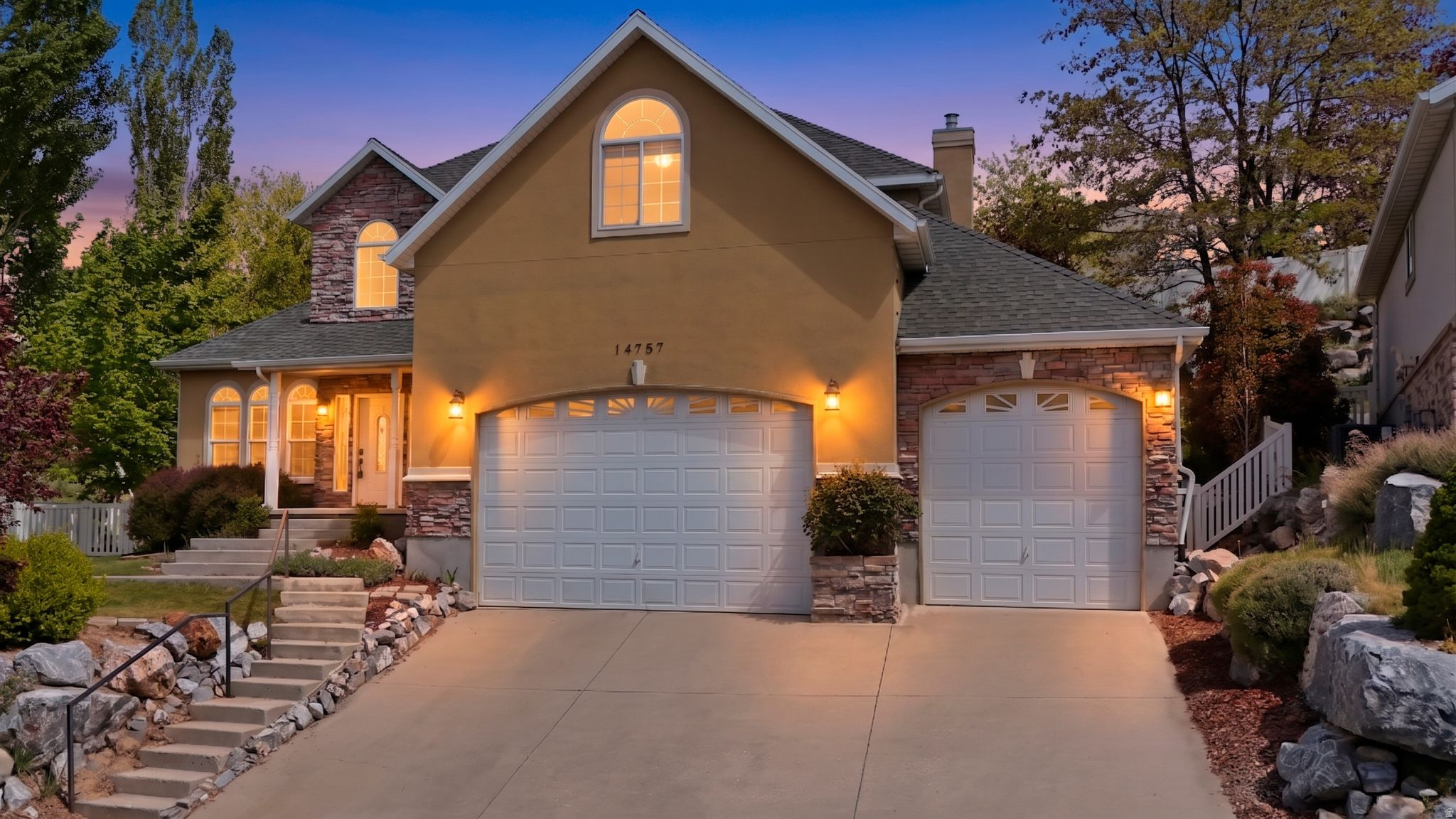 Experience elevated living in this beautiful home ideally located near Draper Flight Park, where you'll enjoy breathtaking sunset views night after night. With convenient freeway access and close proximity to the Bonneville Shoreline Trail this home offers both accessibility, recreation and a peaceful retreat.The east-facing, private patio just off the kitchen is perfect for relaxing summer evenings, while a spacious deck off the primary suite provides a serene escape. Inside, the main floor showcases all-new hardwood flooring and a thoughtfully updated kitchen featuring stainless steel appliances and instantaneous hot water.The very spacious great room off the kitchen provides plenty of space to host and entertain guests. Upstairs you'll find the primary suite offering comfort and functionality with dual closets and a luxurious ensuite bath complete with a separate tub and shower. Downstairs, the fully finished basement expands your living space with a second kitchen, two bedrooms, bath, and a large family room. Whether you envision a home theater with projector wiring already in place, a game room, or multi-generational living, the possibilities are endless. Additional highlights include electrical already run to the garage for a future EV charging station and a minimal HOA of just $250 per year.This is a rare opportunity to own a home that combines thoughtful updates, flexible living space, and an unbeatable location. 3 photos virtually staged.